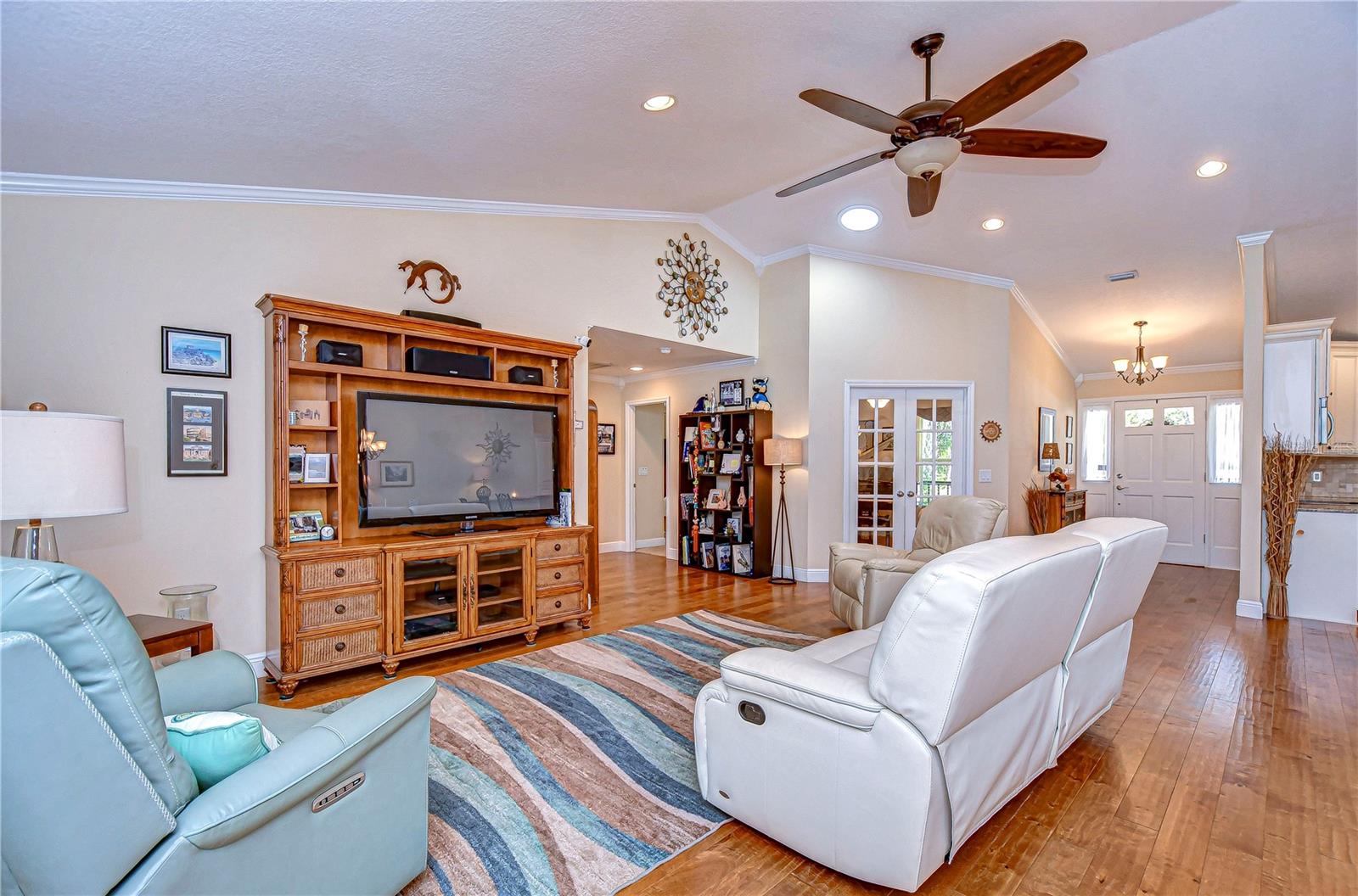 This inviting living space, boasts high ceilings and ample space!