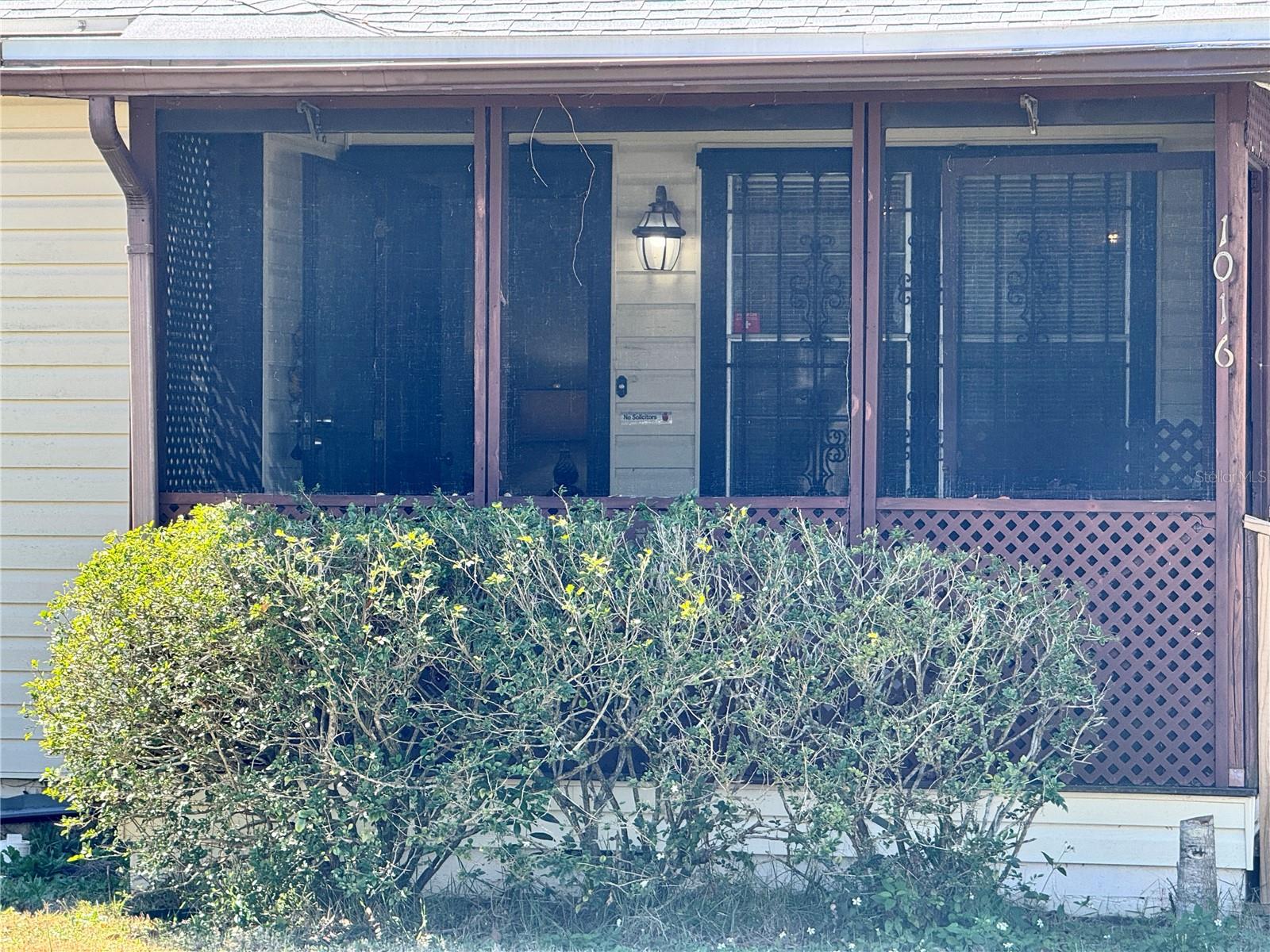 Covered and screened front porch 12' x 8'