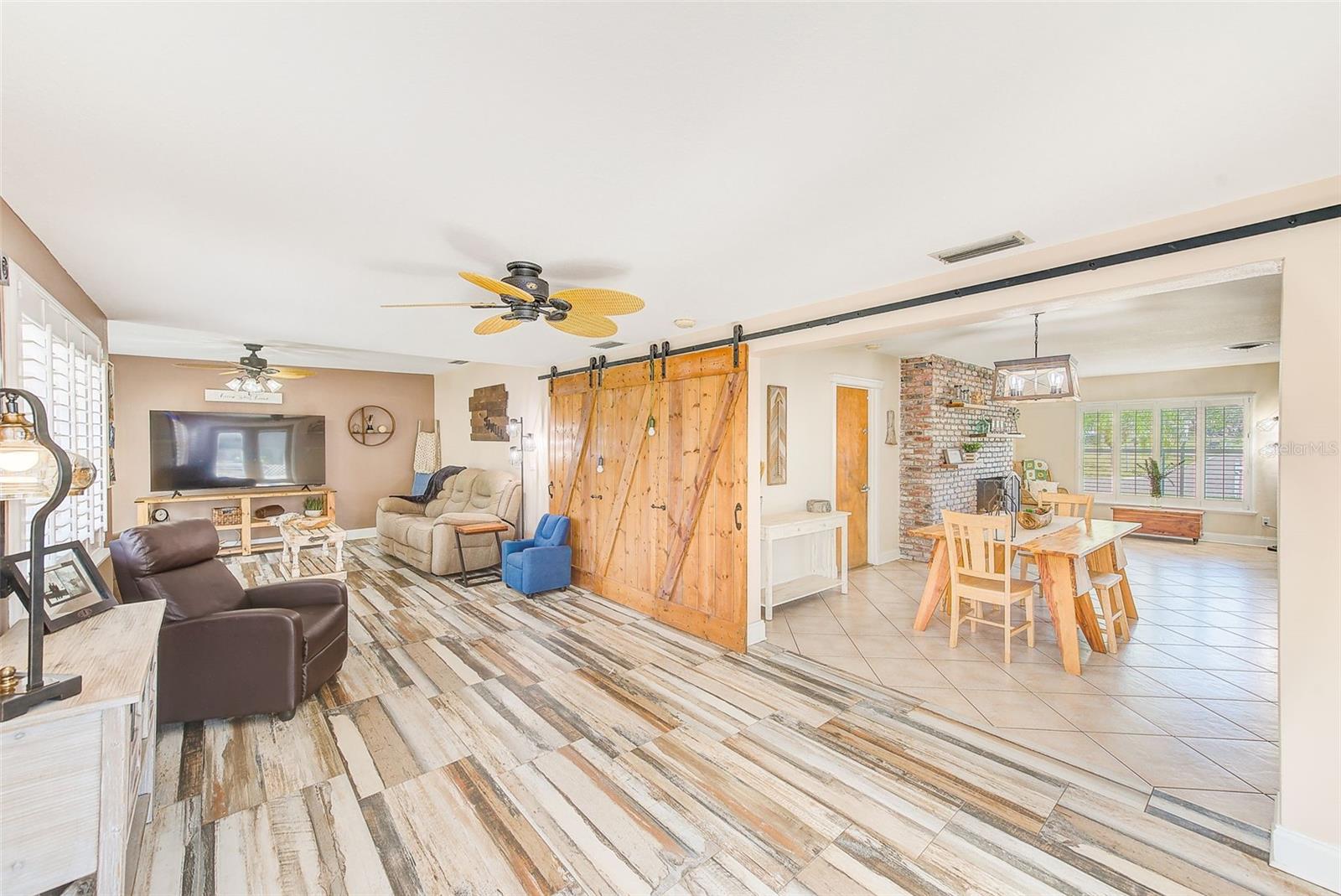 Huge family room with custom barn doors that can be closed to make room completely private