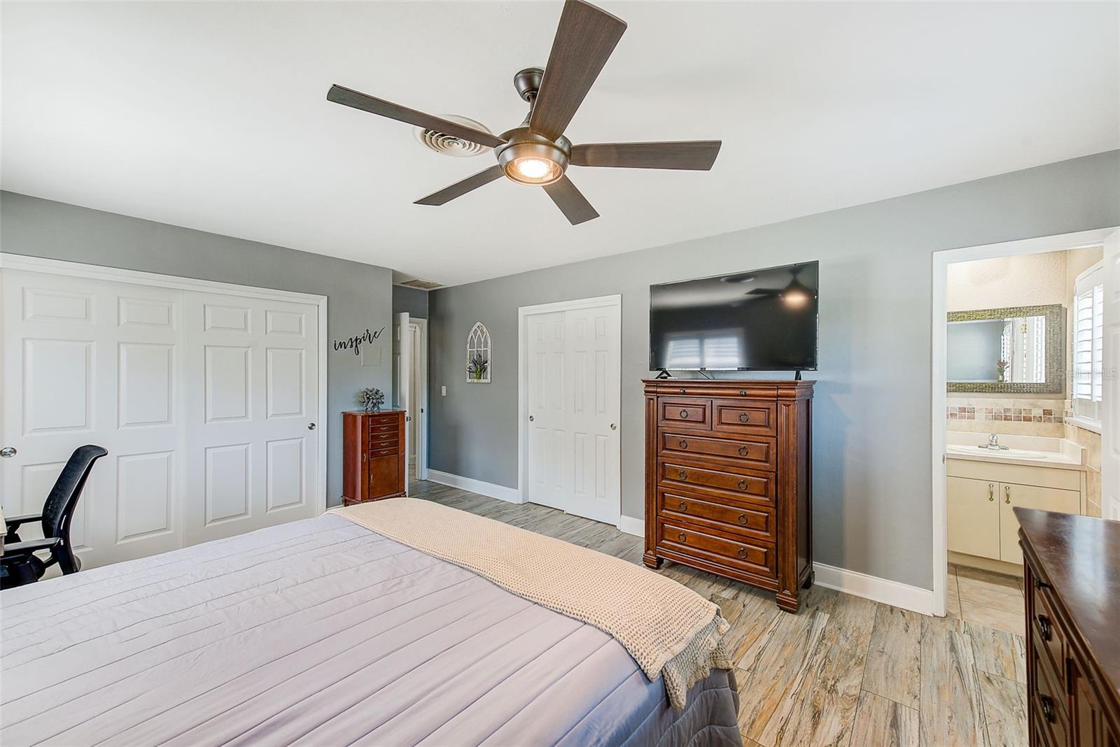 Plantation shutters with lighted ceiling fan