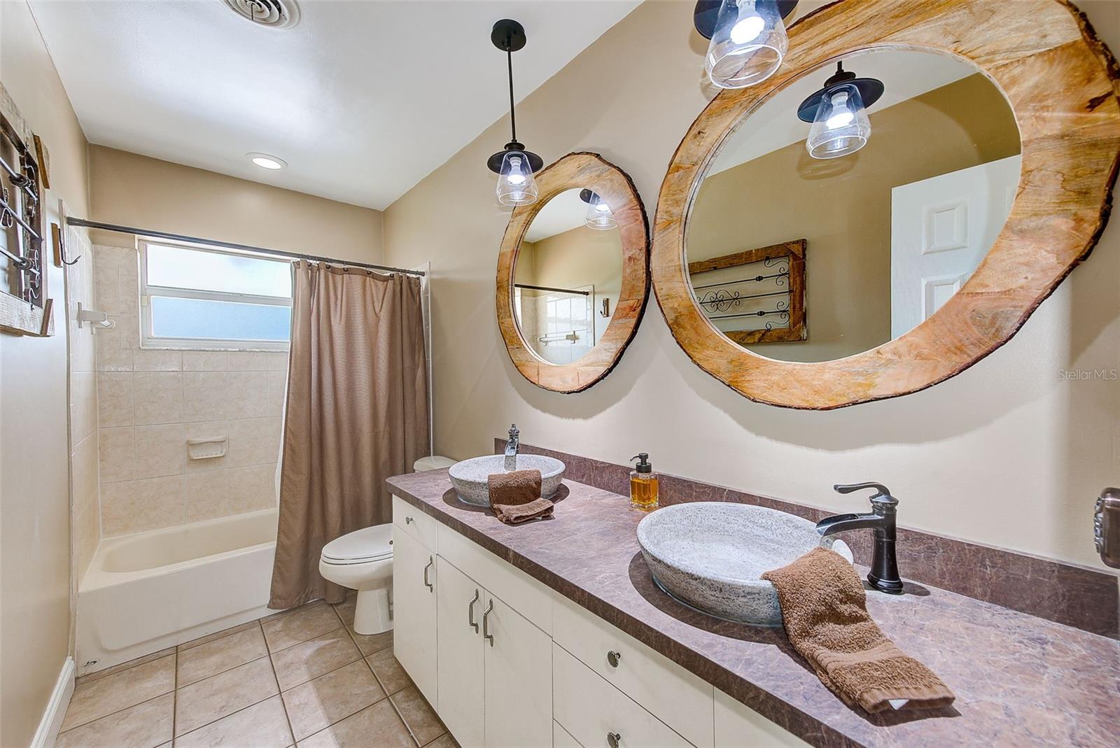 Second bathroom with shower and tub