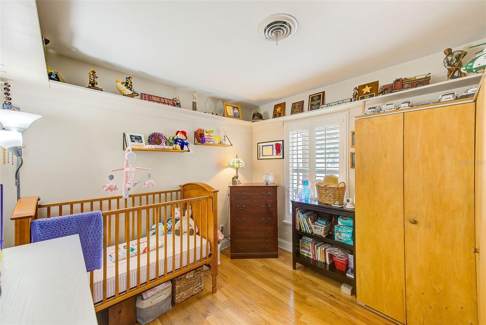 Third bedroom with custom built-in storage.