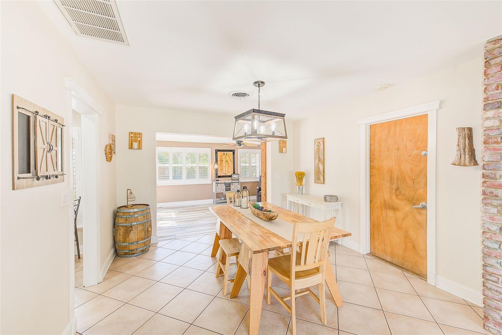 Dining room between living room and family room - kitchen to the left