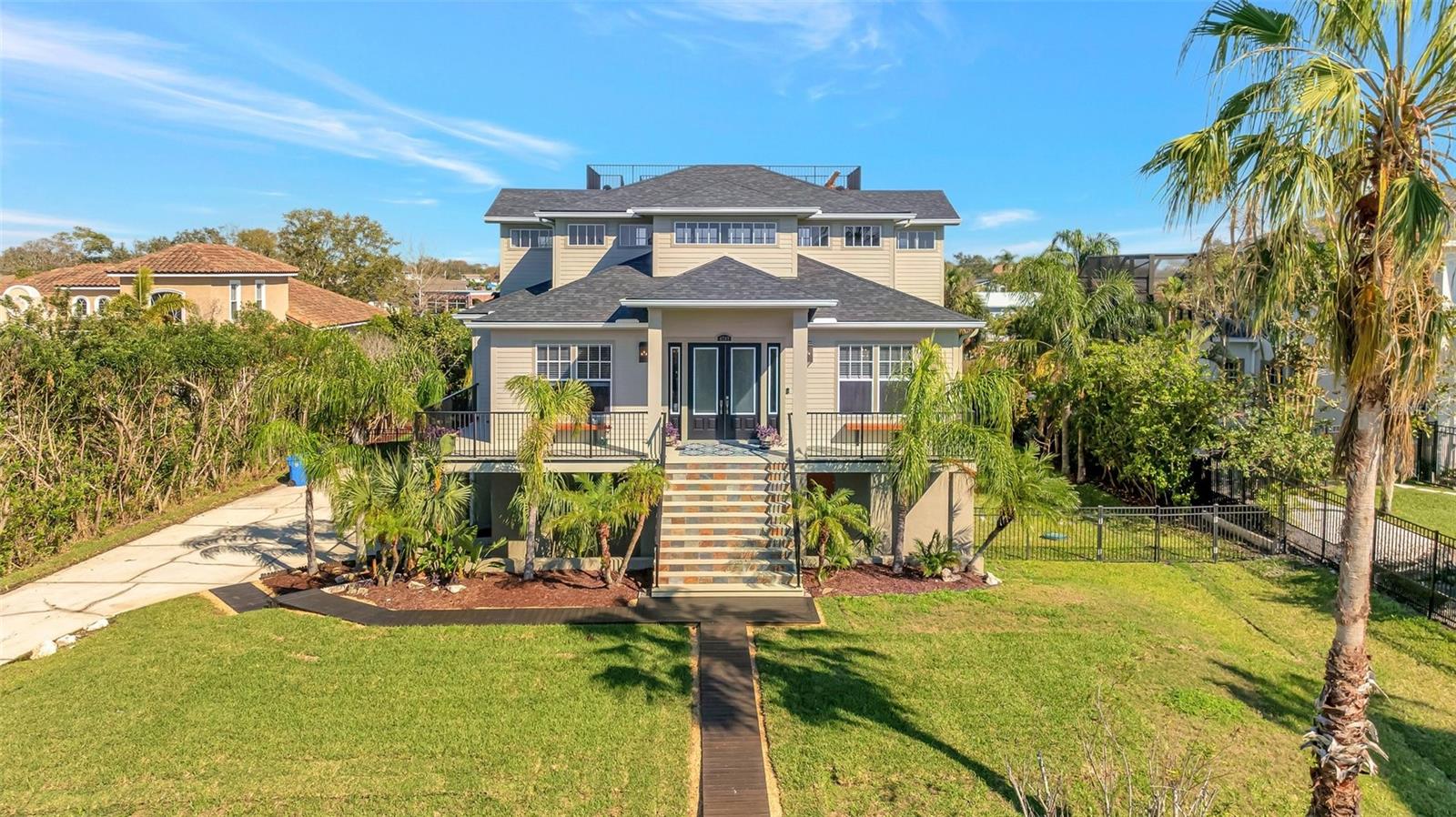 Welcome home to your coastal contemporary waterfront oasis.