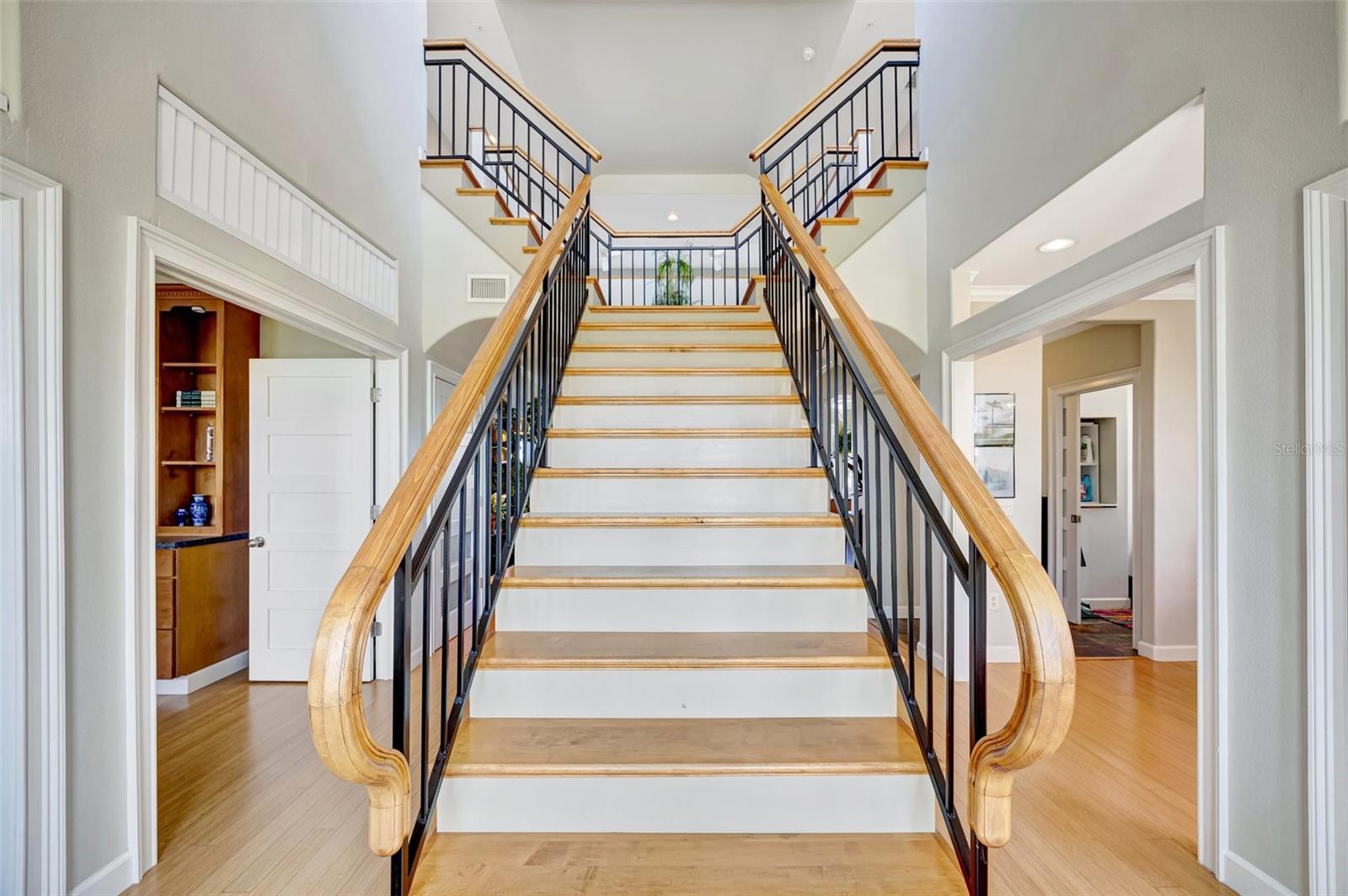 Such a dramatic and airy foyer.