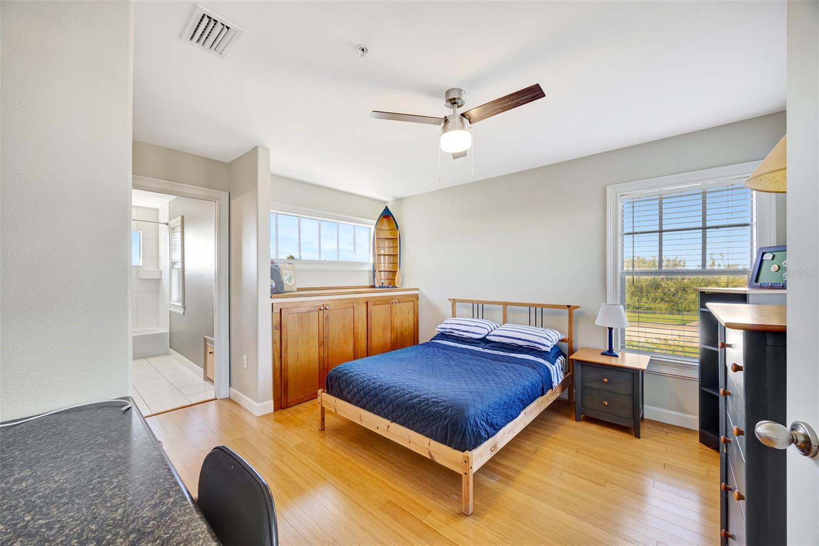 Guest bedroom with ensuite bath right off of loft area.