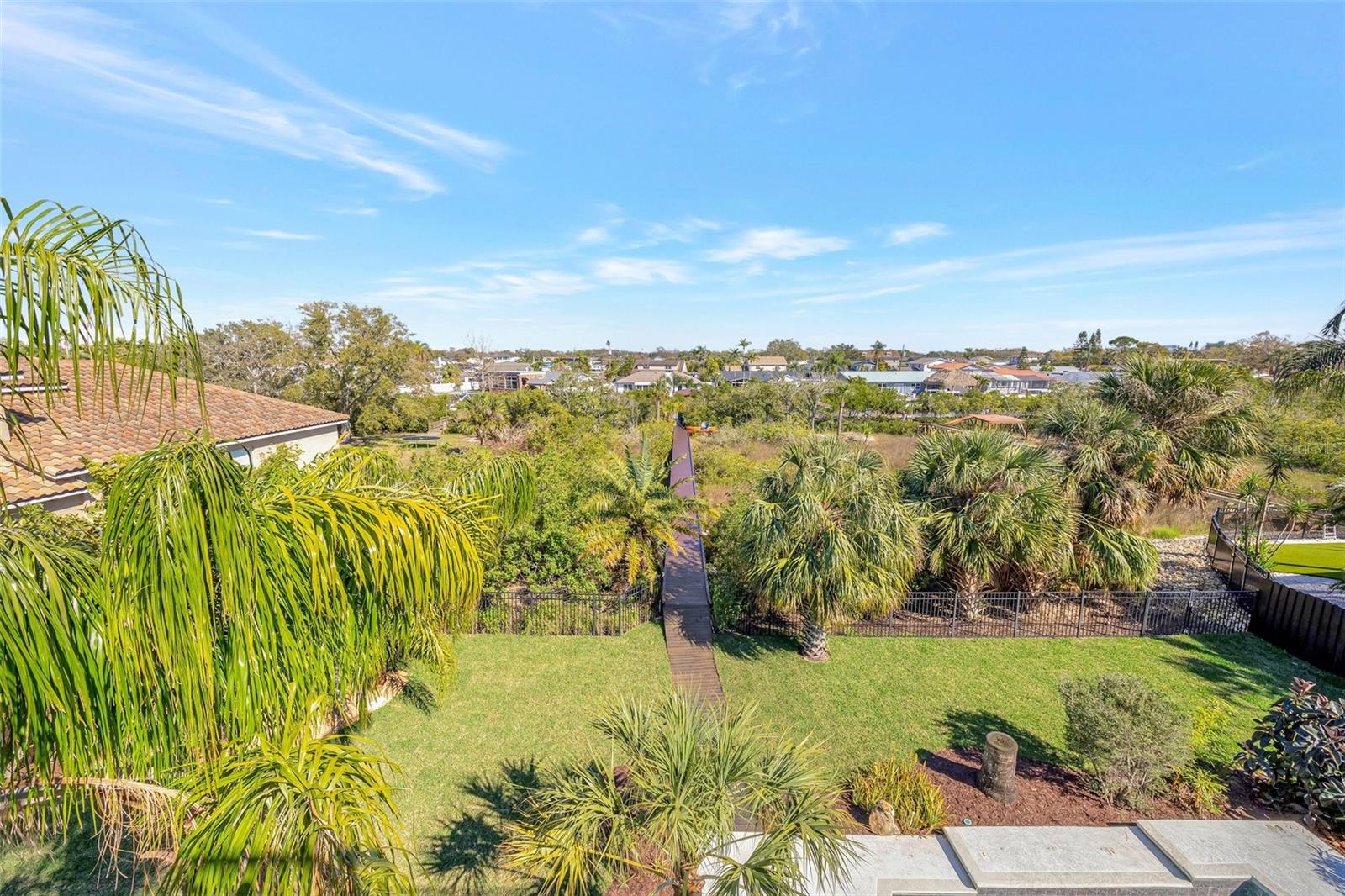 Extra large backyard, with preserve beyond the sodded yard.