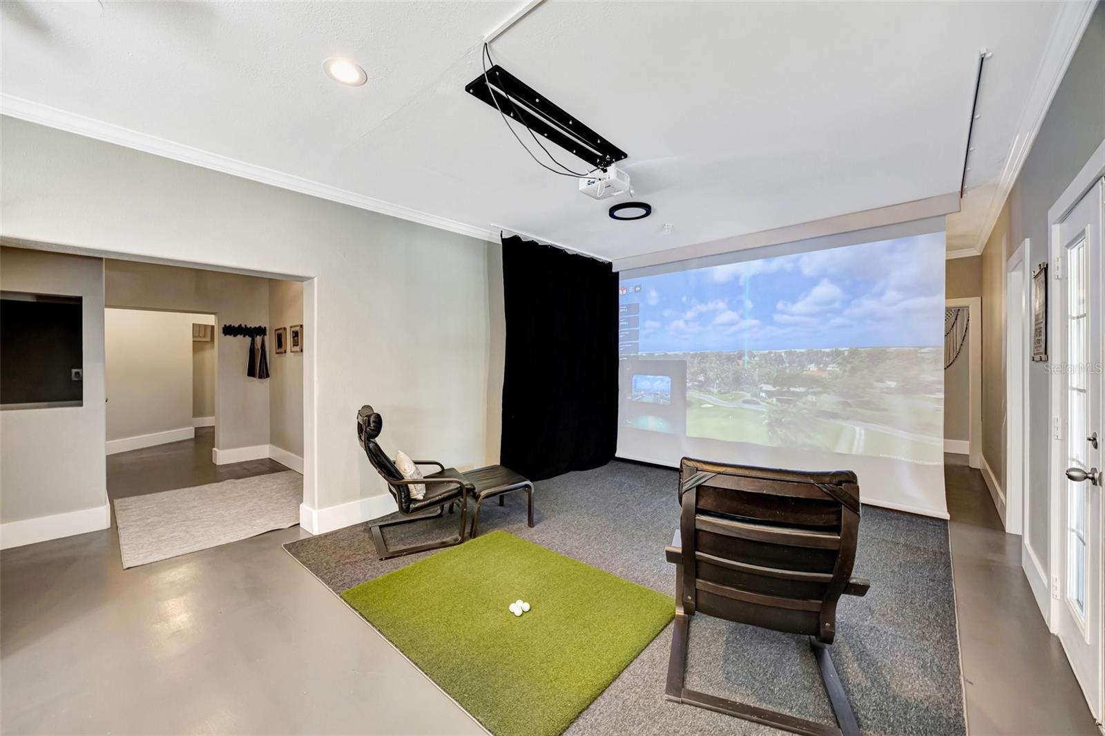 Ground floor: Amazing golf simulator and/or projection TV for the sports fan.