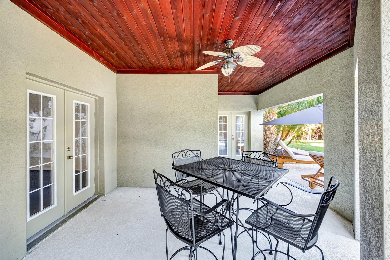 Ground floor: Escape the sun with a shady porch and still overlook the pool.