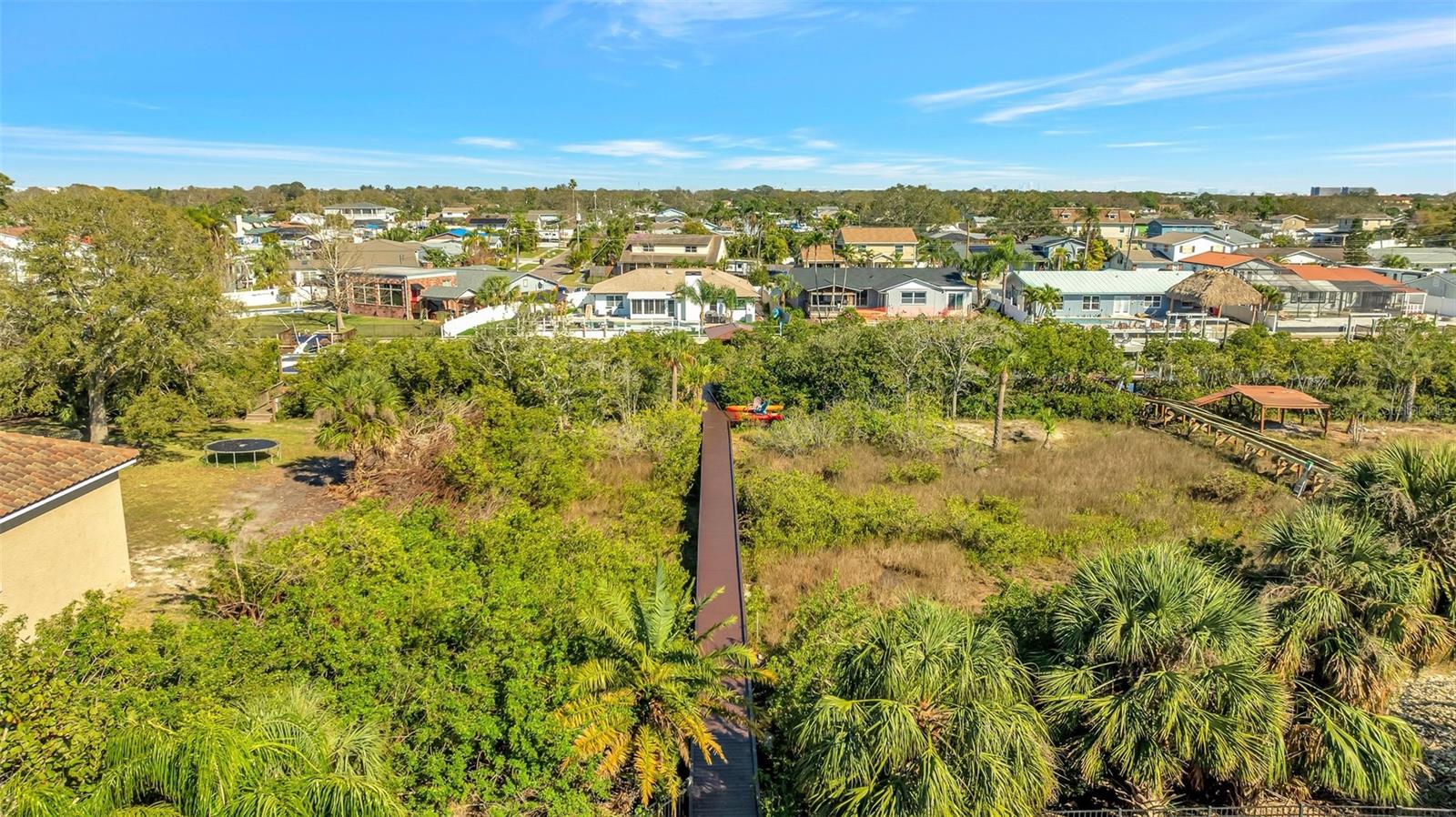 Your very own preserve begins after your sodded yard, with a long new boardwalk taking you out to the water.