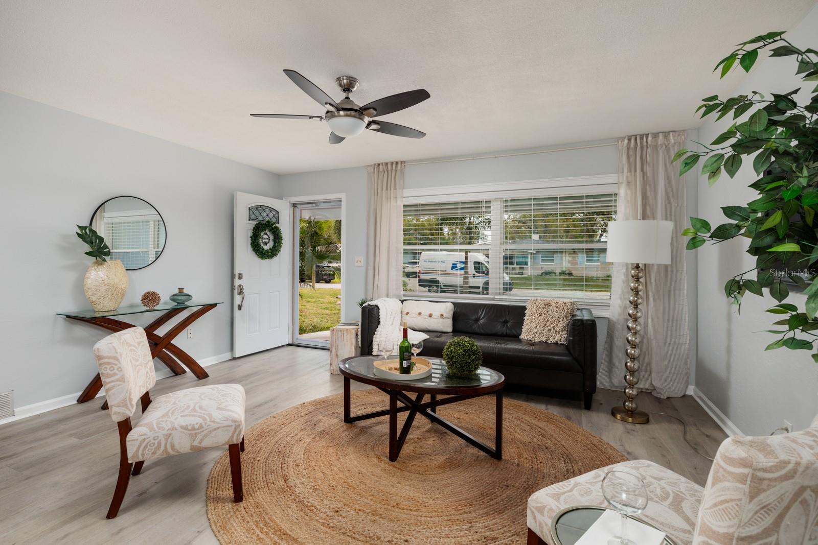 Bright Living Room. Luxury vinyl floors throughout.