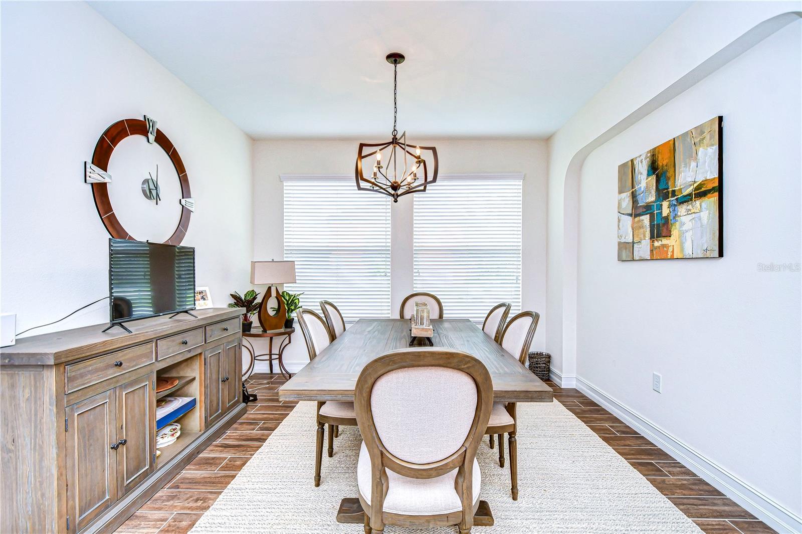 legant dining space, where modern chic meets classic charm.