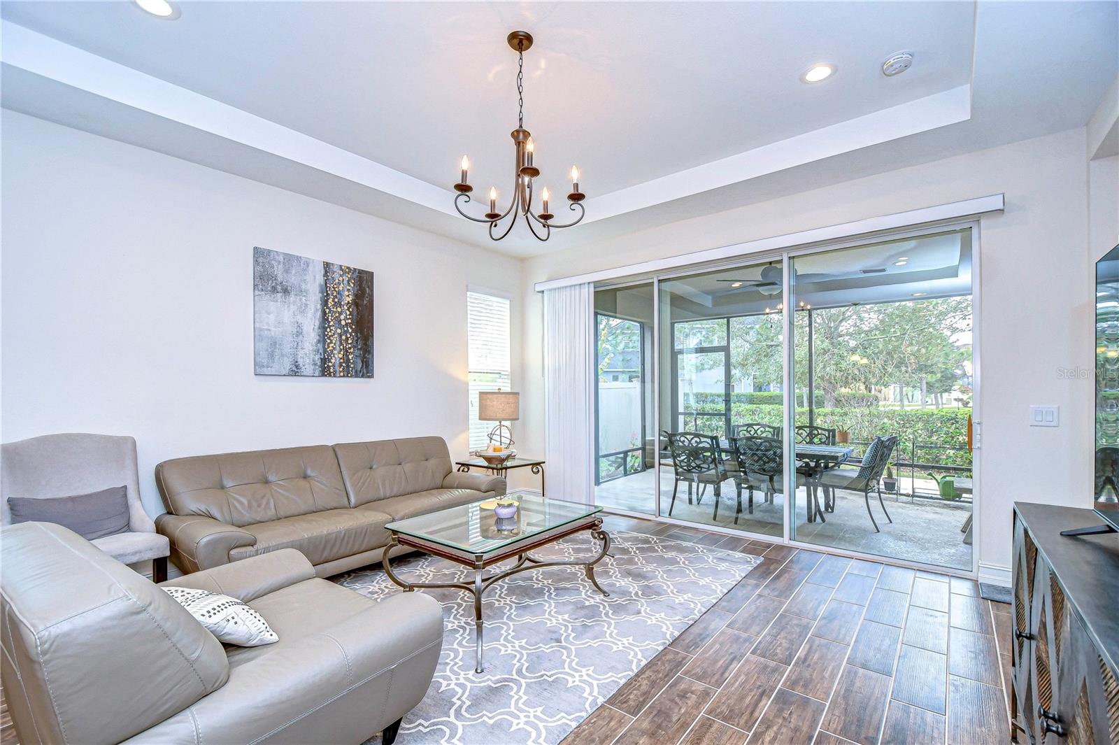 Step into a serene living room with natural lighting and abundant space