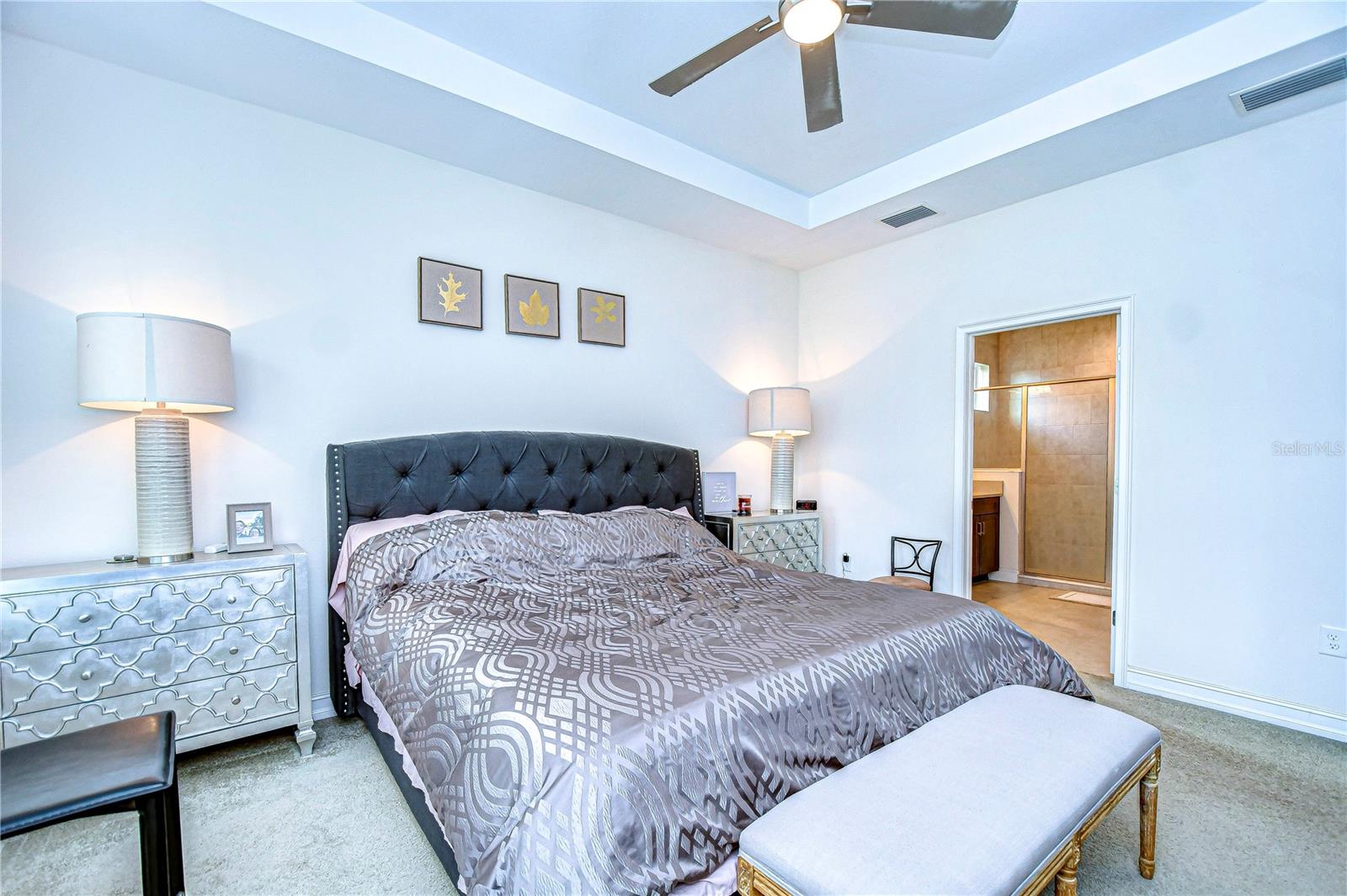 Ample space and stylish tray ceiling make this a true retreat!