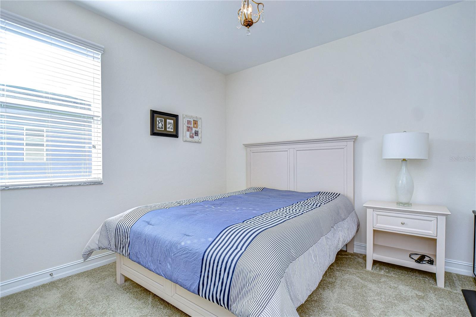 This third bedroom is ideal for unwinding and retreating.