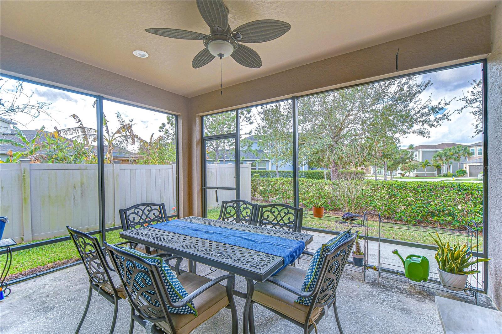 Retreat to your screened patio , perfect for dining al fresco while enjoying Florida's warm evenings.