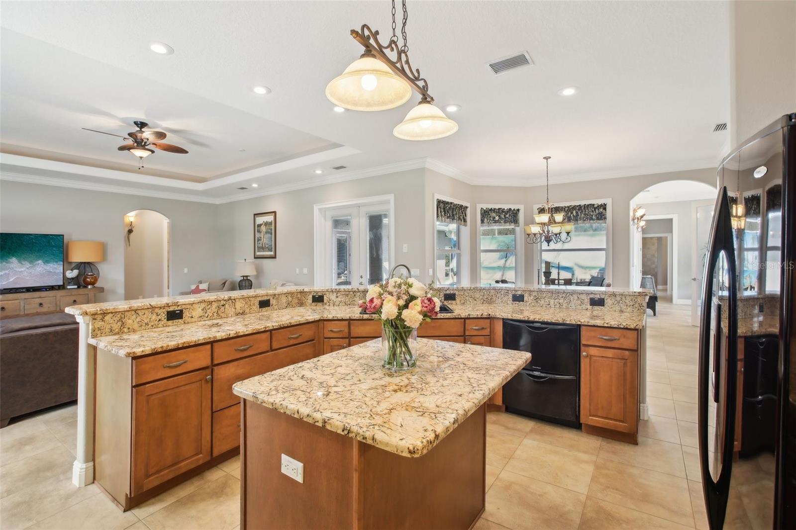 Eat in kitchen with 42 inch cabinets beautiful granite and black appliances