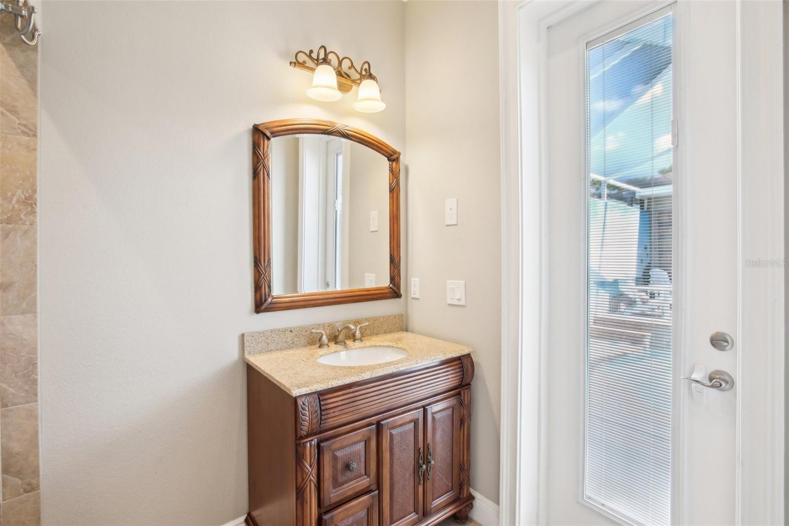 Ensuite bathroom with large double walk in shower and separate vanities