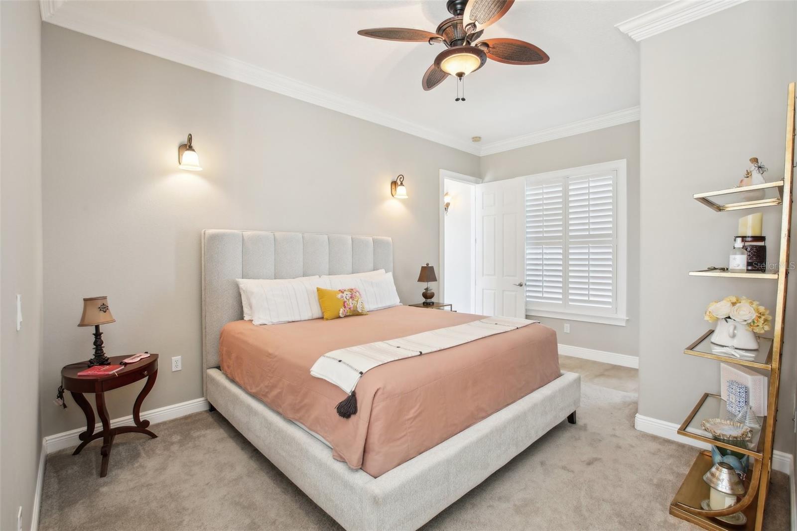 Primary Bedroom #3 with , plantation shutters, sitting area and beautiful ensuite bathroom