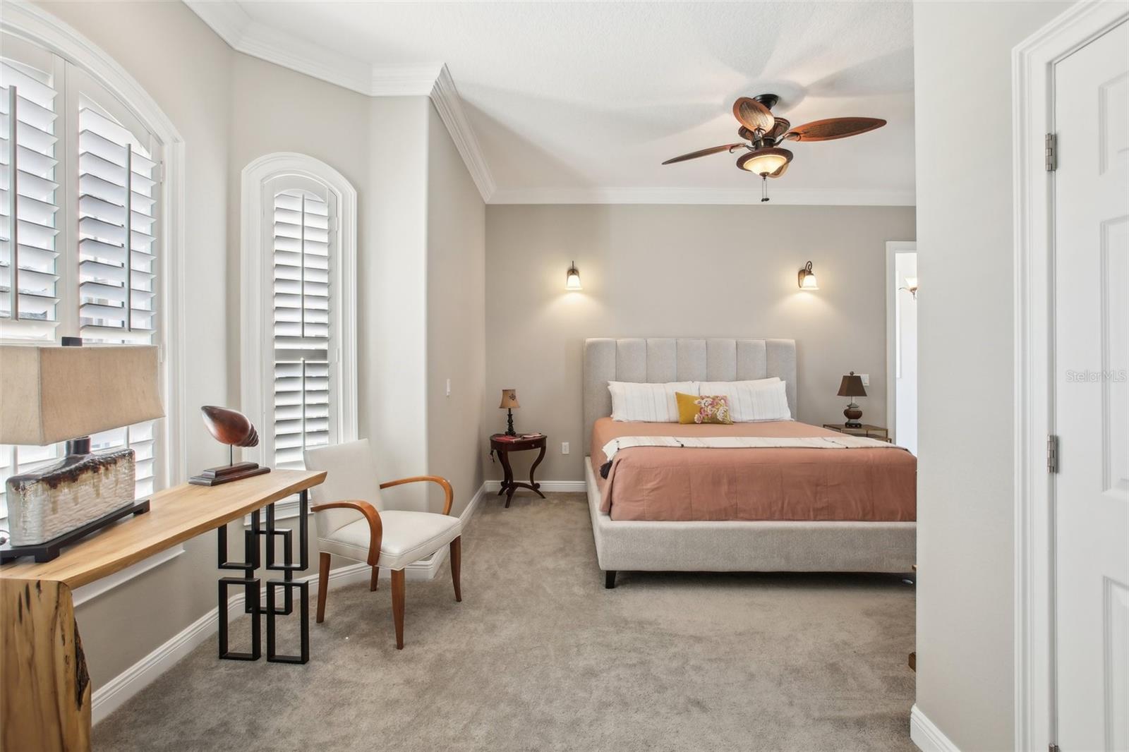 Primary Bedroom #3 with , plantation shutters, sitting area and beautiful ensuite bathroom