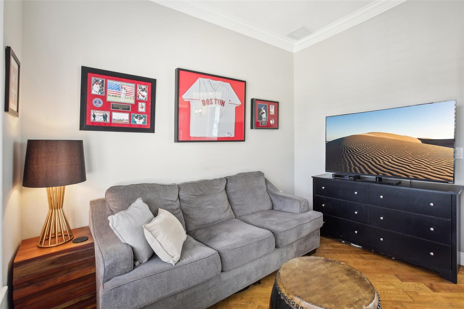 Beautiful office den with hardwood floors and beautiful French doors