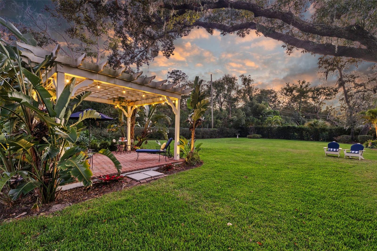 Enjoy the outdoors in the pergola out back!