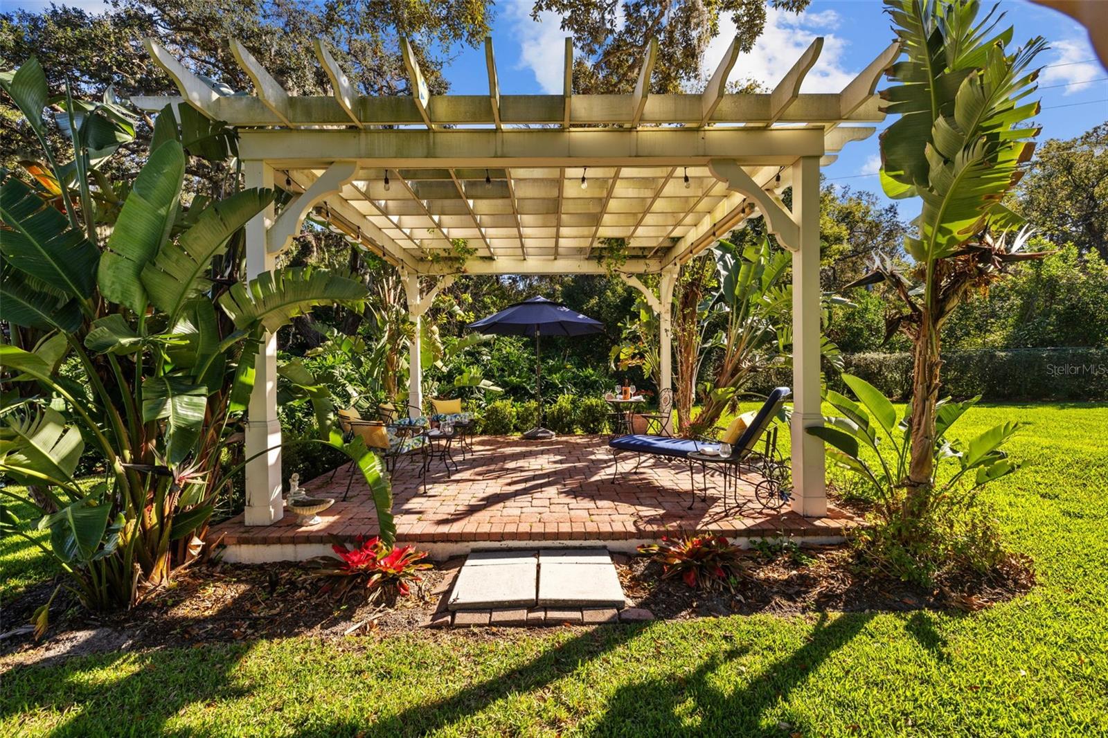 Enjoy the outdoors in the pergola!