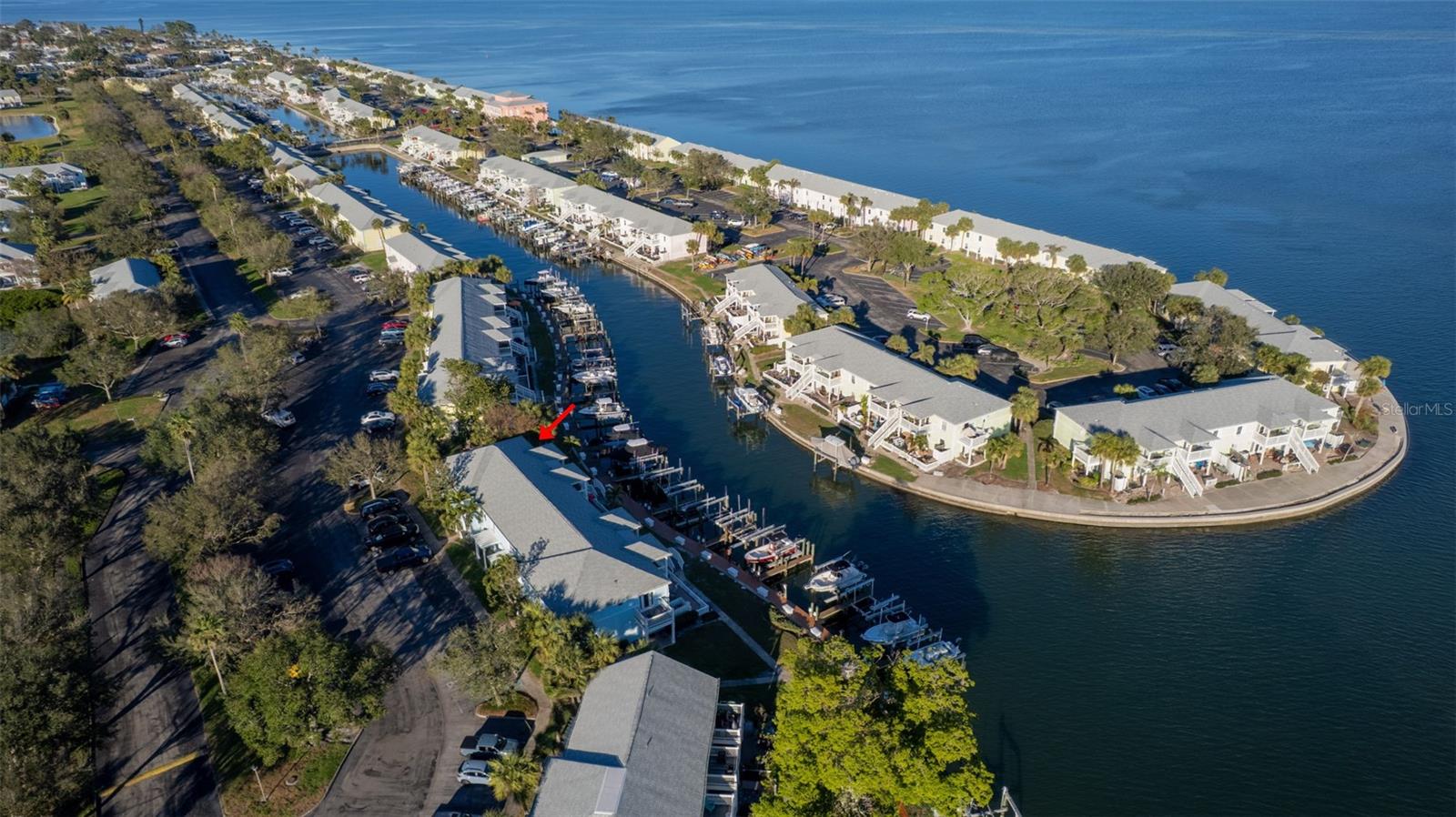 Plenty of parking on one side of your unit and the deeded boat slip steps away on the other side!