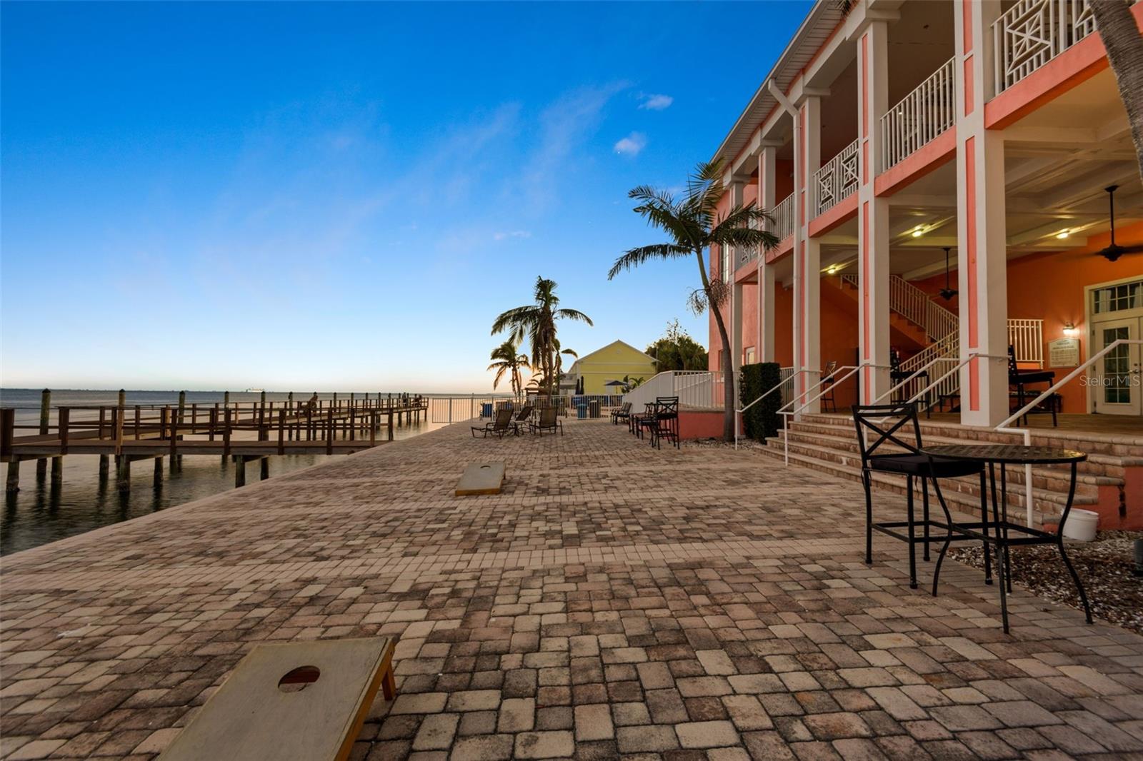 Patio and dock behind the Waterside Yacht Club / Clubhouse