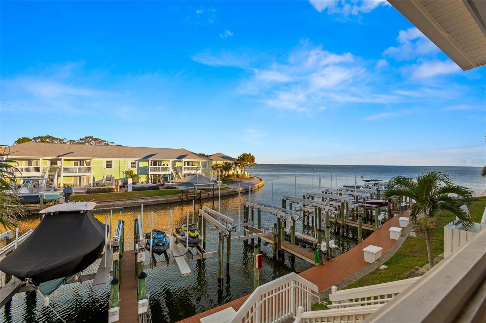 Private deeded dock #85 SS with 13,000lb lift, currently housing 2 jet skis.