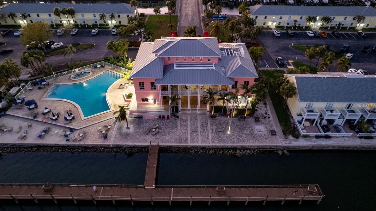 Waterside Yacht Club with the main pool and spa on the south side of the Clubhouse.  Community dock area with seating to enjoy the breathtaking view of Tampa Bay.