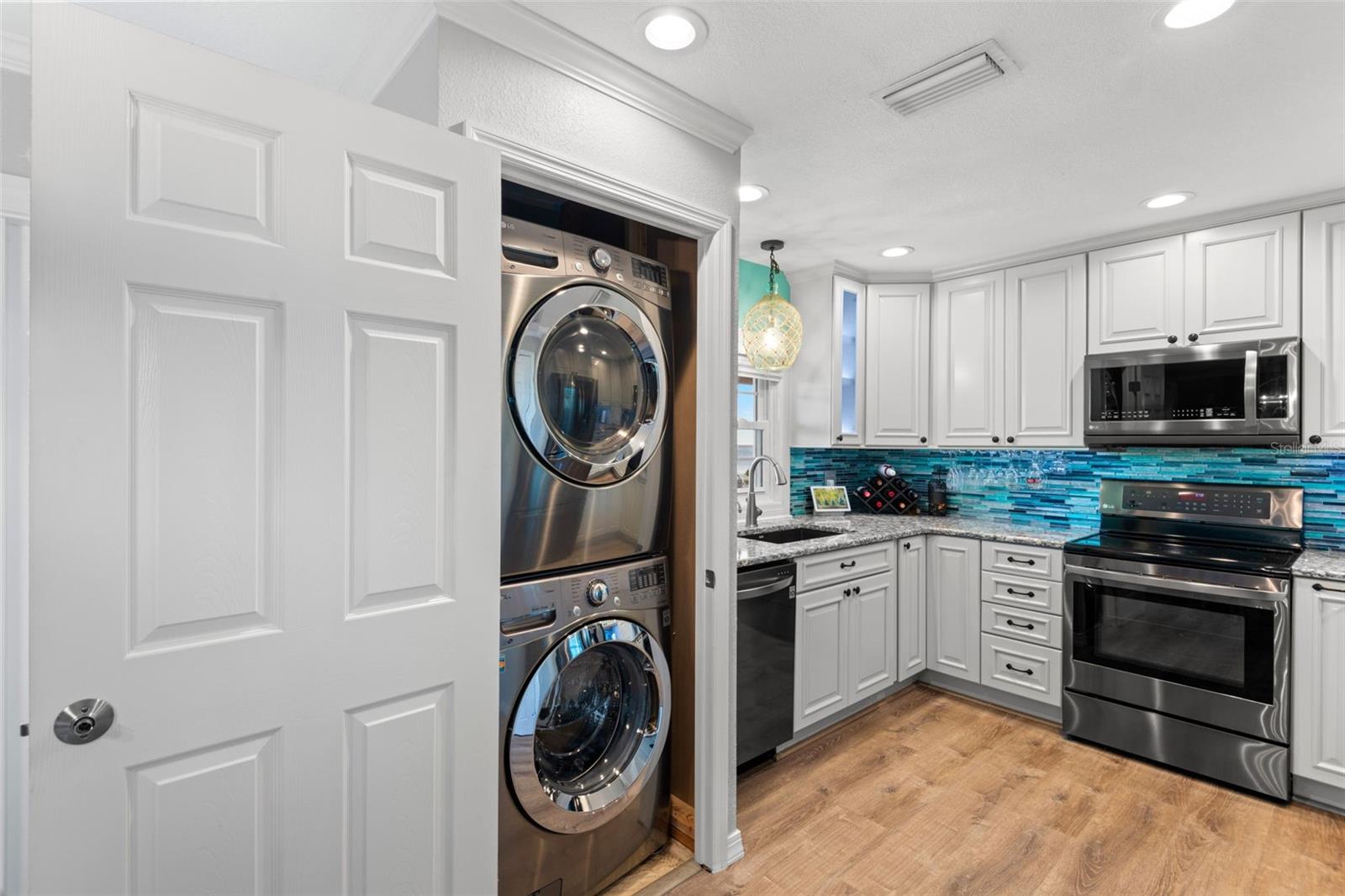 Room for full size washer and dryer conveniently within reach.