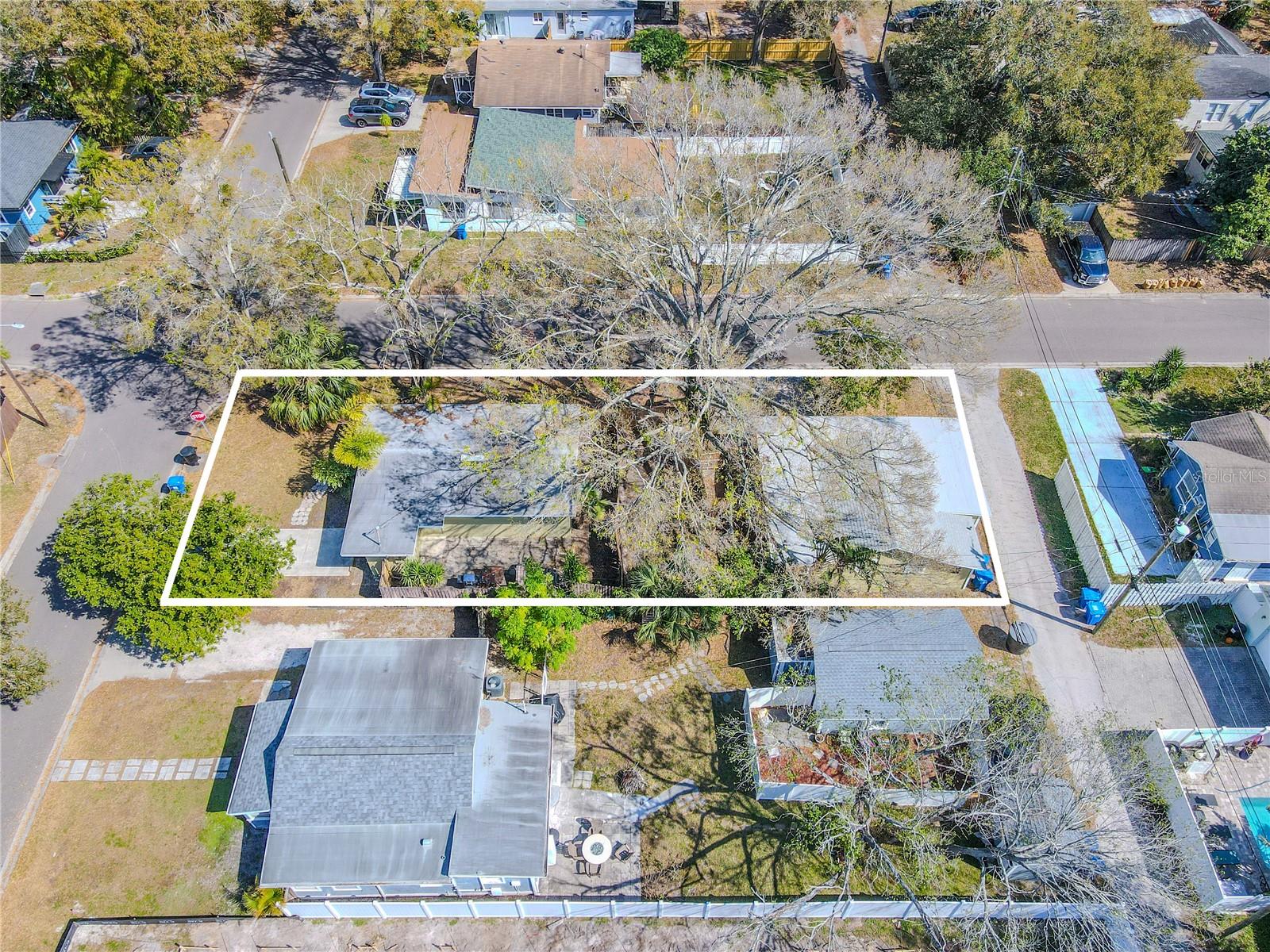 Overhead view. 2 separate homes on a corner lot.