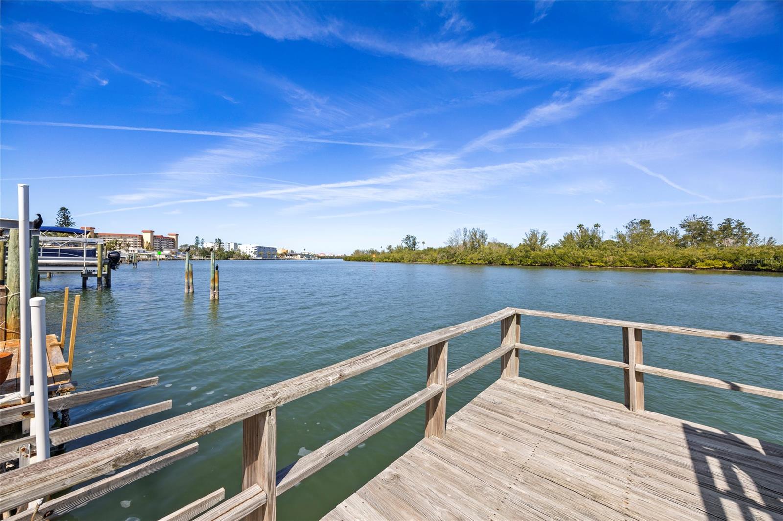 Dock with intracoastal and preserve views