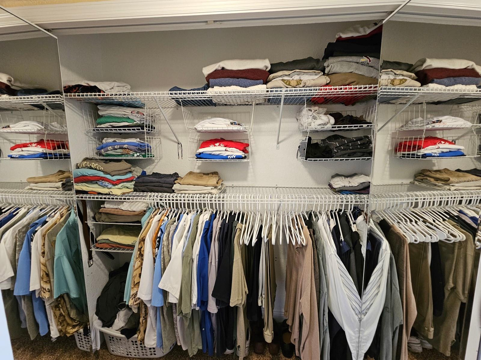 Two closets in the Primary bedroom