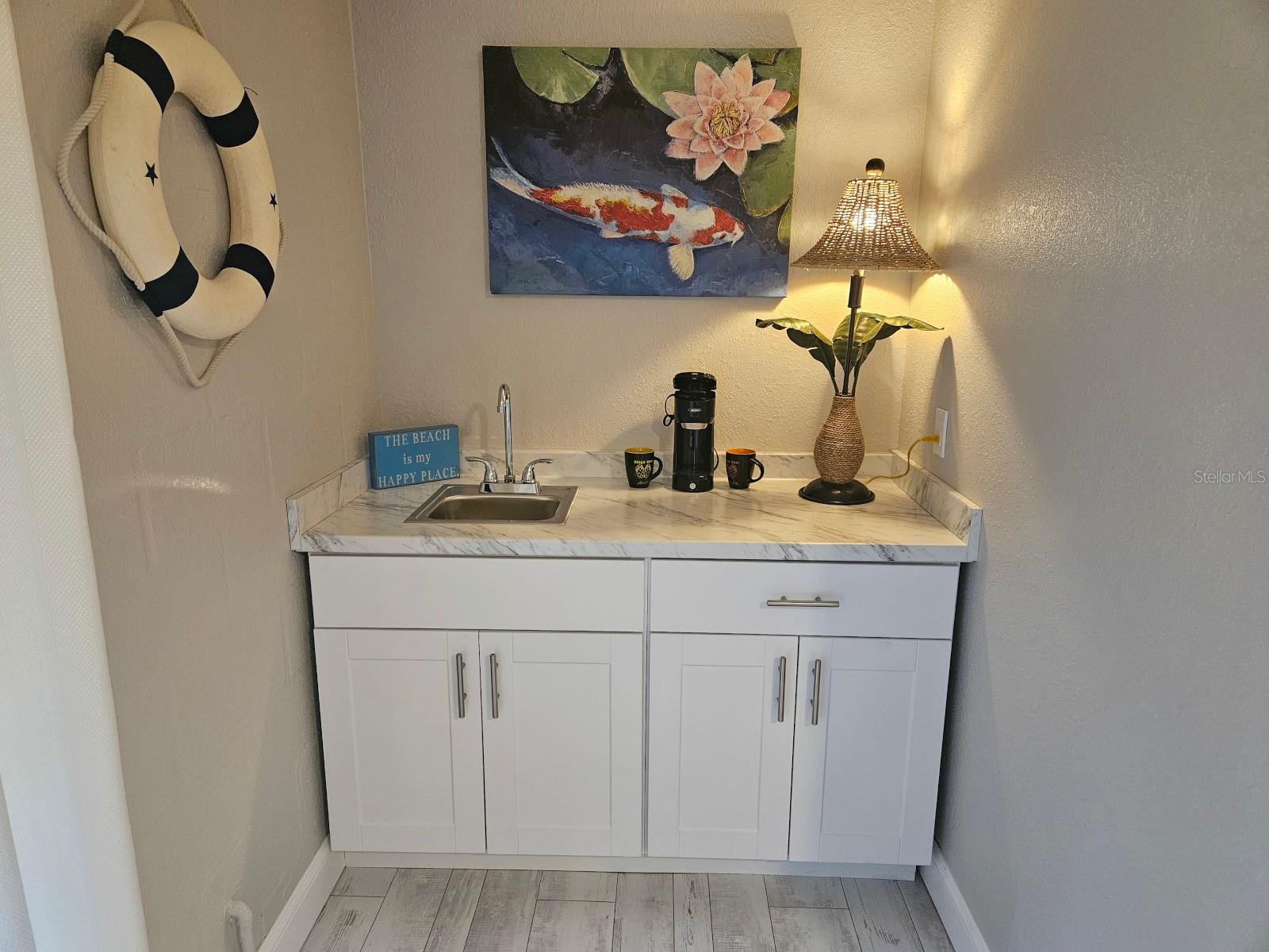 Bonus room includes a bar sink area