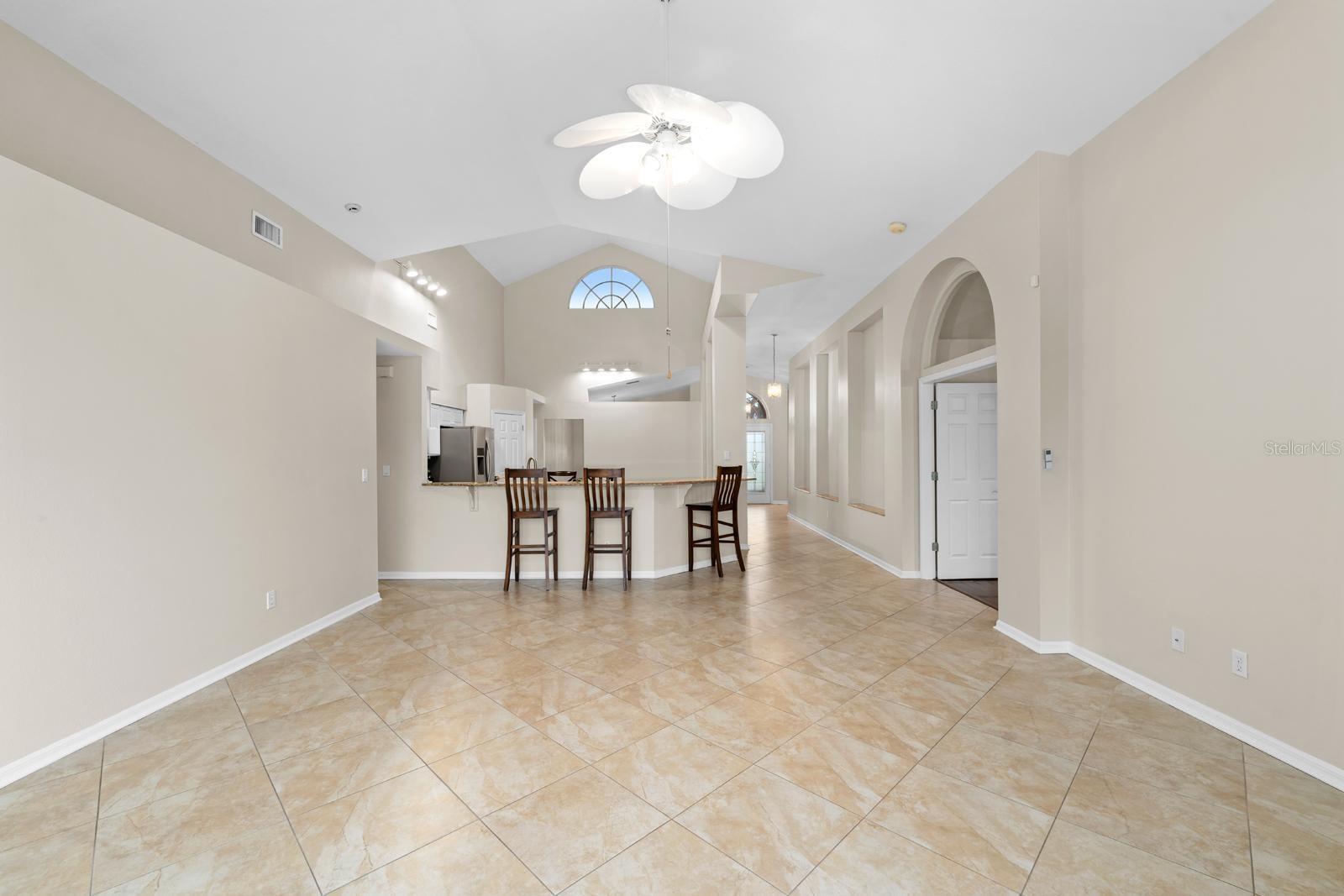 All of the main living areas feature porcelain tile flooring and new paint.  The living room is 20x18 in size.