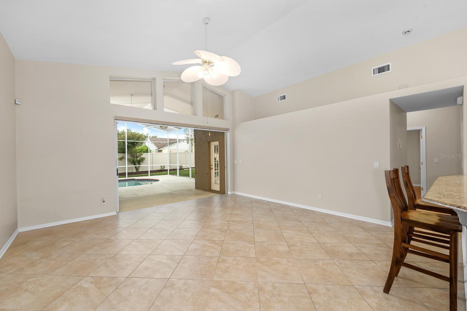 The main living room is 20x18 and features a triple sliding glass pocket door that opens up all the way!  What a great feature for entertaining!