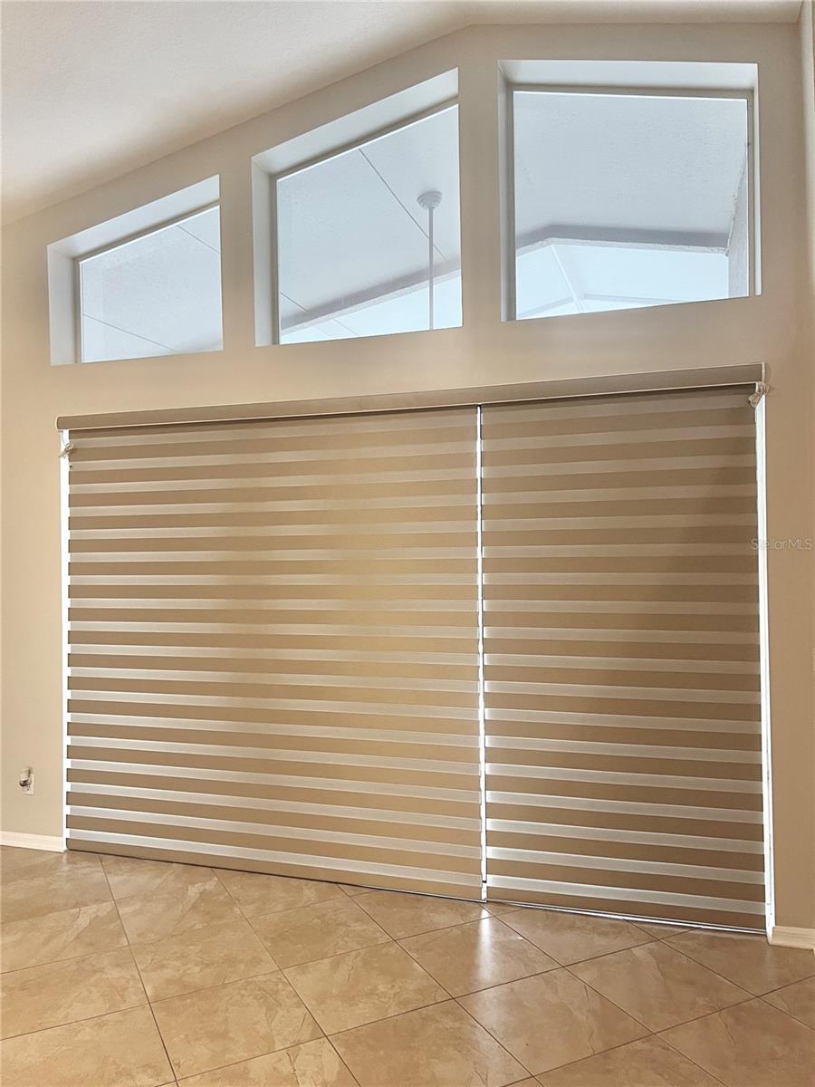 This is an example of the window shades down in the main living room. These are controlled by a remote, very convenient! You can allow various amounts of light in depending on where you stop the shades.