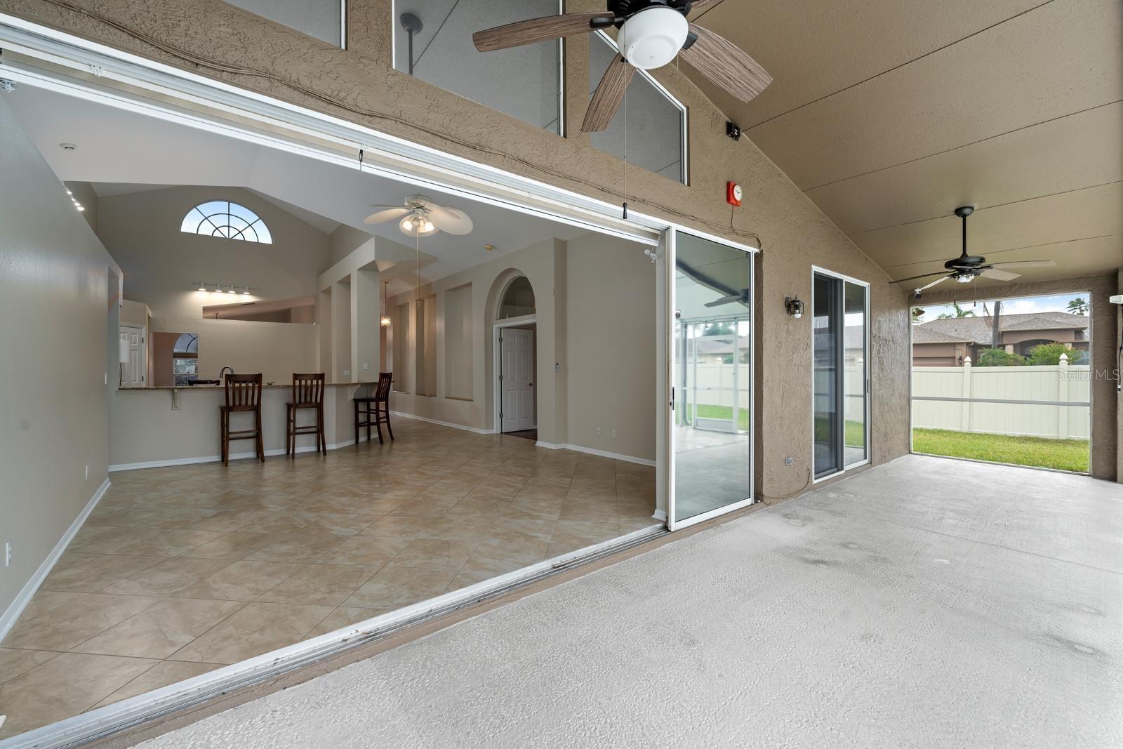 The 8' tall triple sliding pocket door is perfect for entertaining!