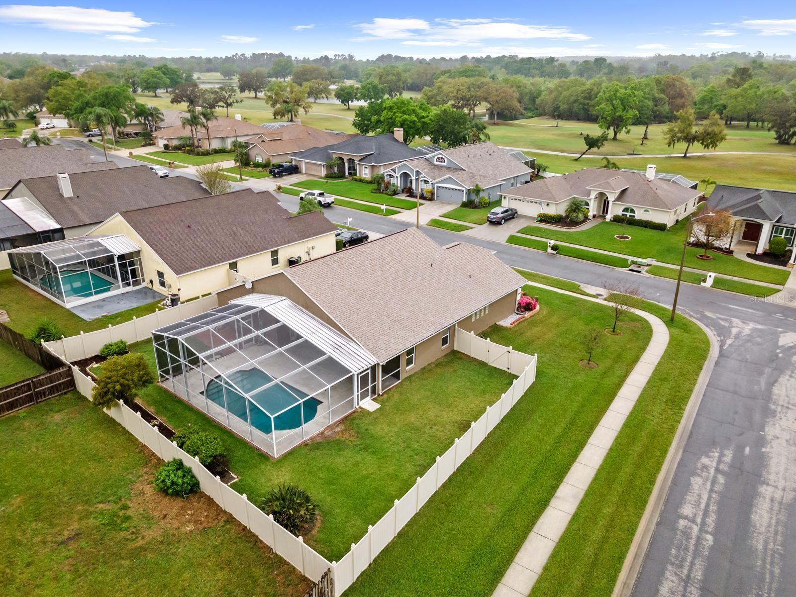 Corner lot and vinyl fenced-in yard.....and 2022 ROOF.