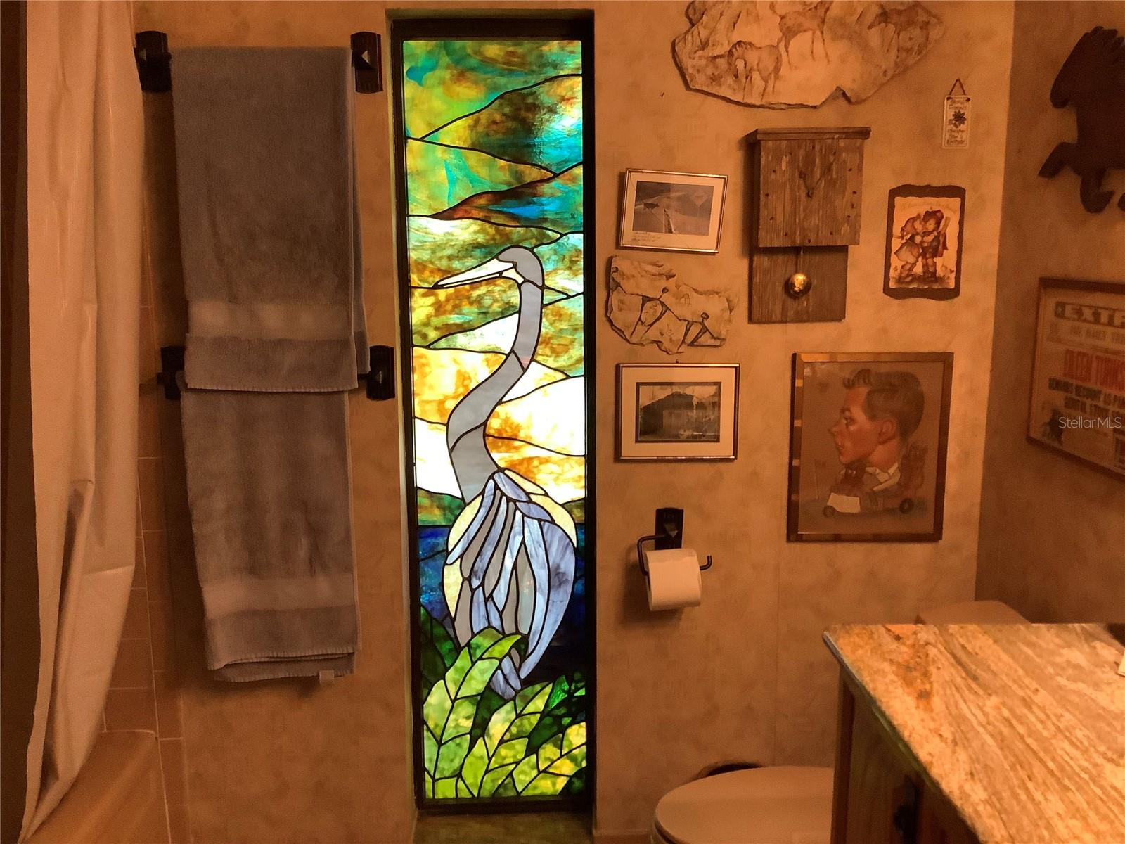 Custom stained glass in 1st bathroom