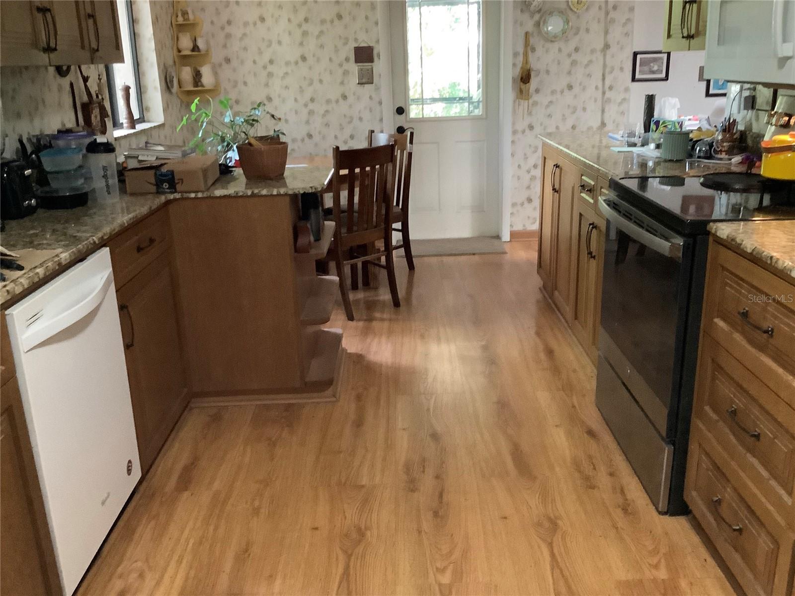 Eat-in Kitchen and door to side patio