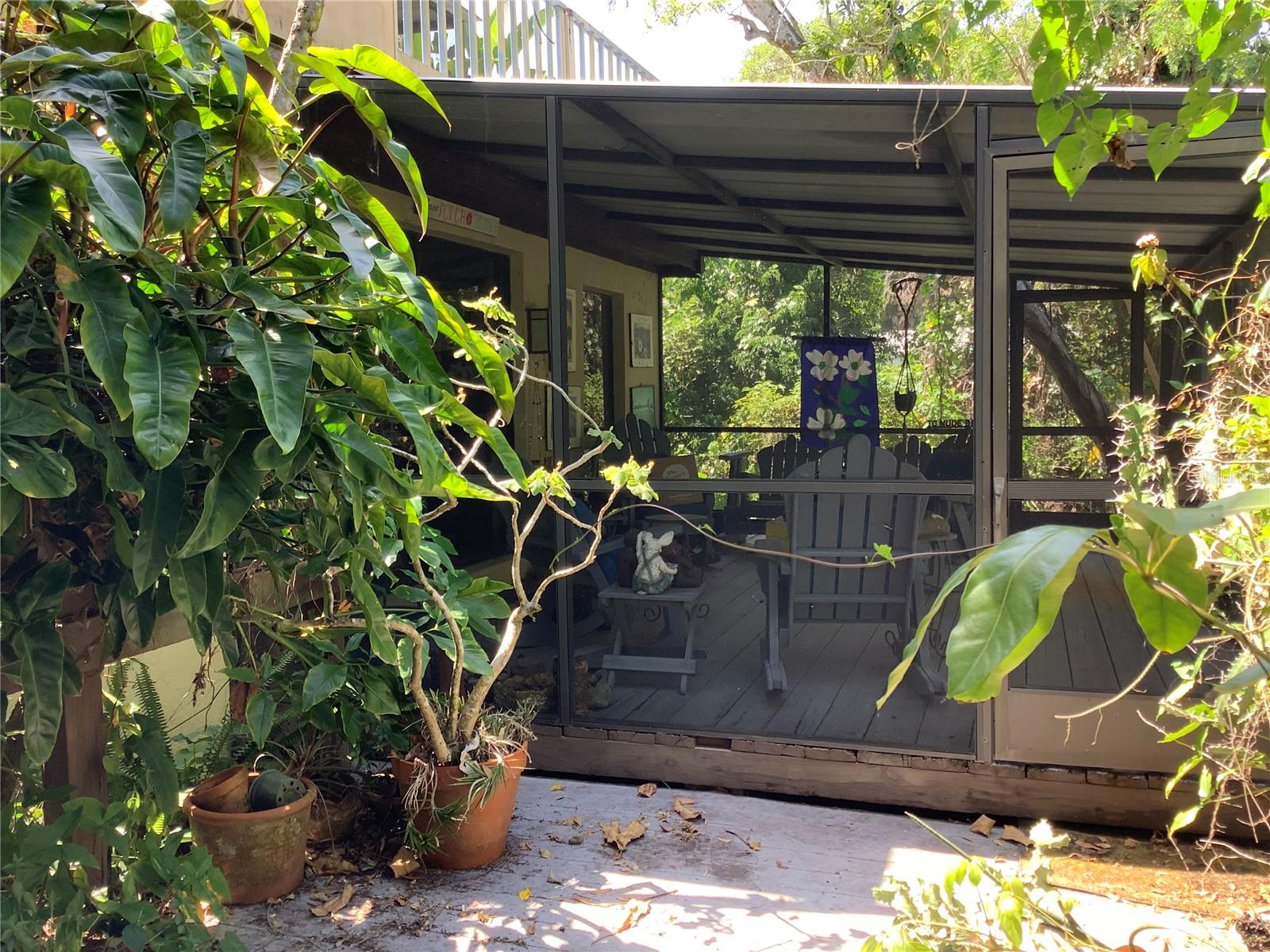 Side view of lower rear patio and upper deck