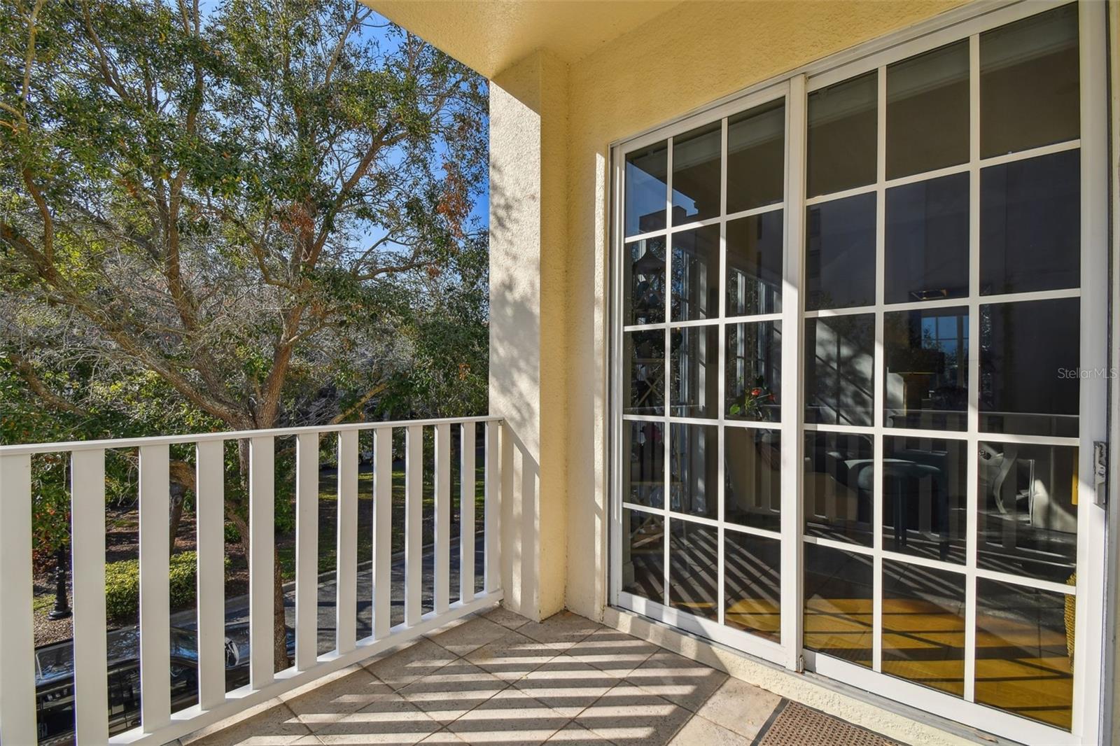 Balcony looks out over Printery Park and mature Oak trees