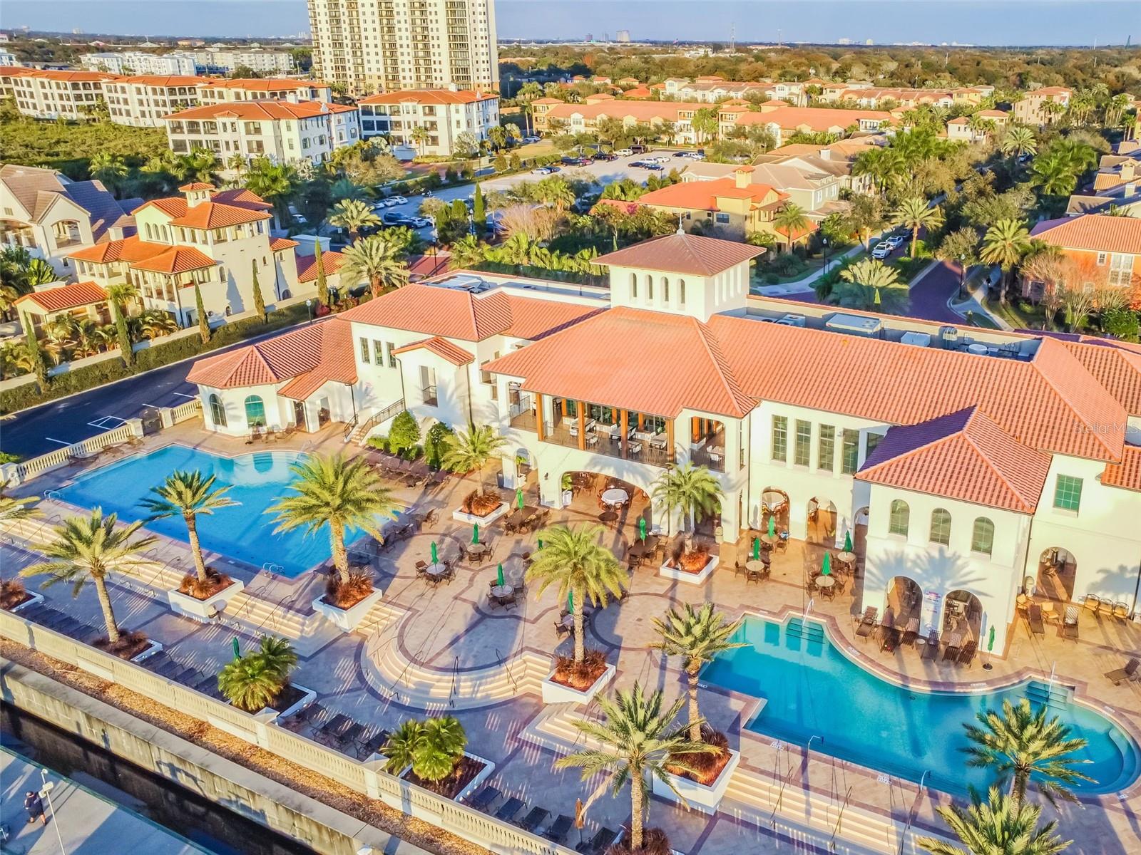 The back of The Bay Club features 2 pools, Marina view and Tiki Bar!