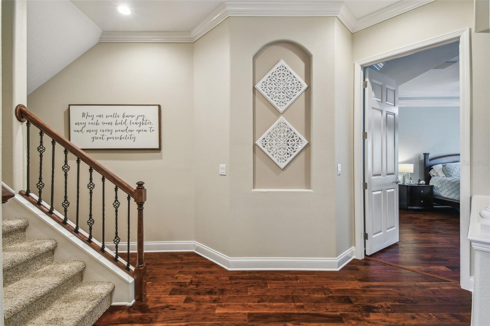 Staircase & Entry to First Floor Primary Suite