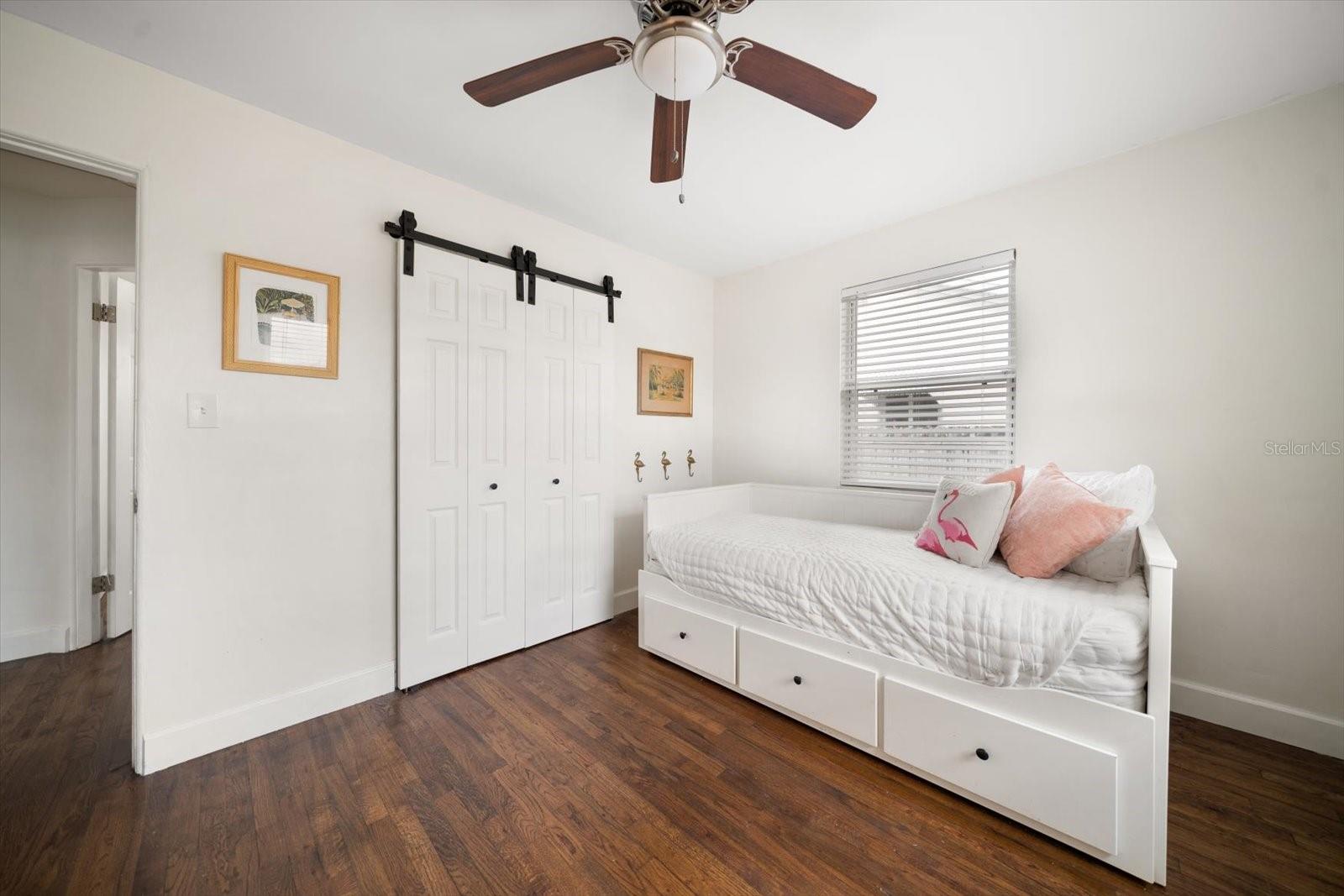 bedroom 2 closet with barn doors