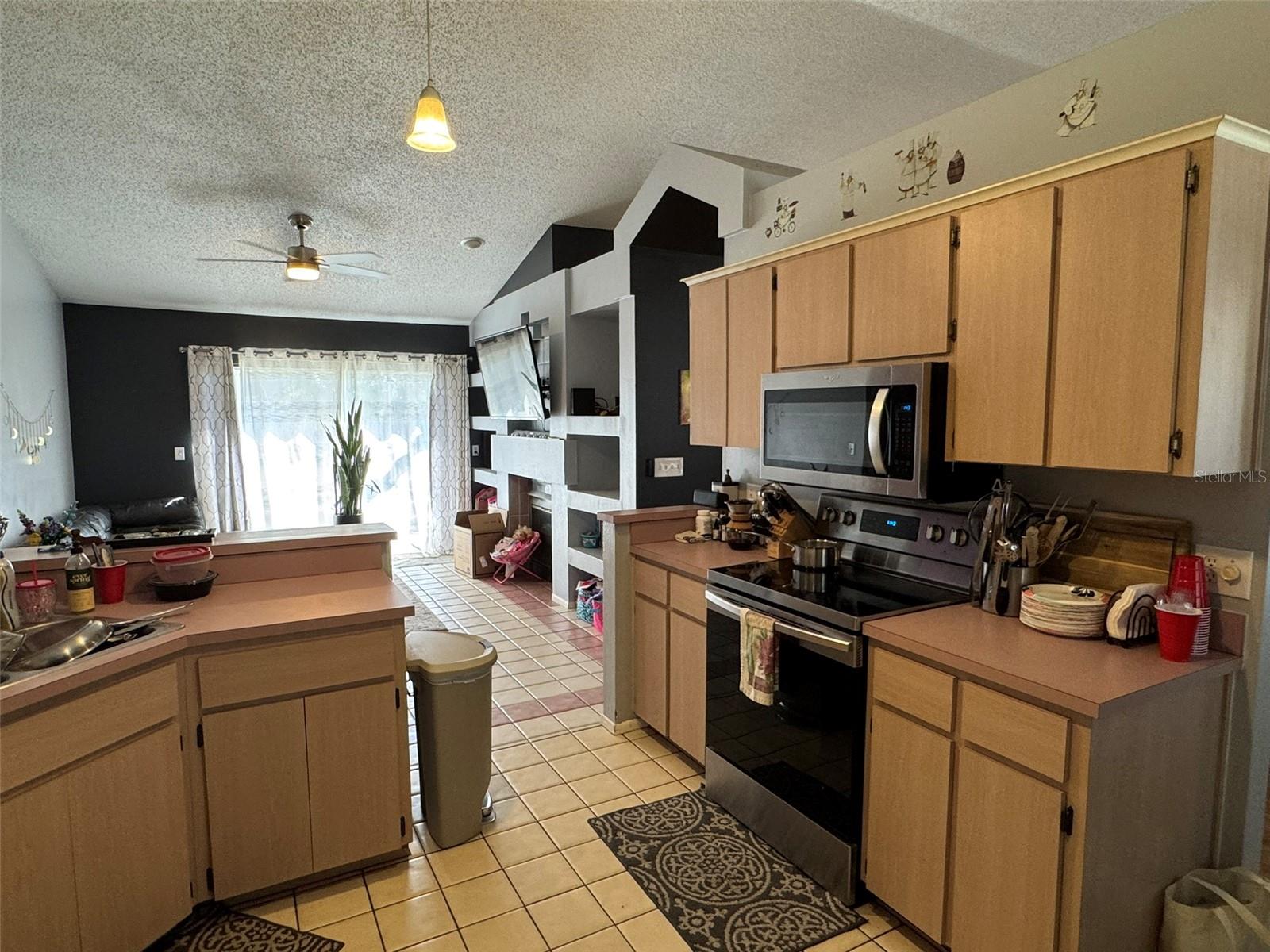 kitchen overlooking family