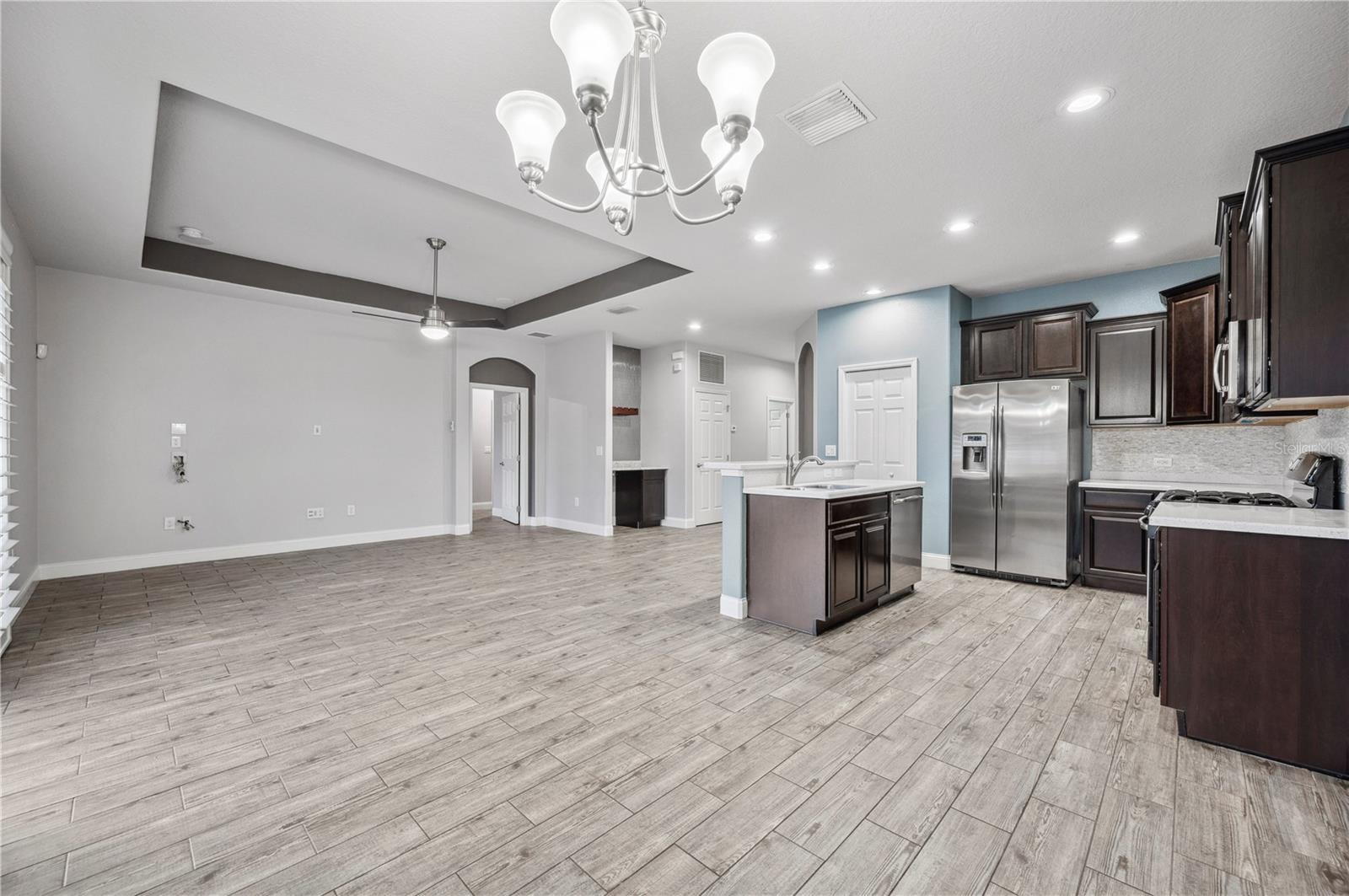 Grand room opened to large kitchen